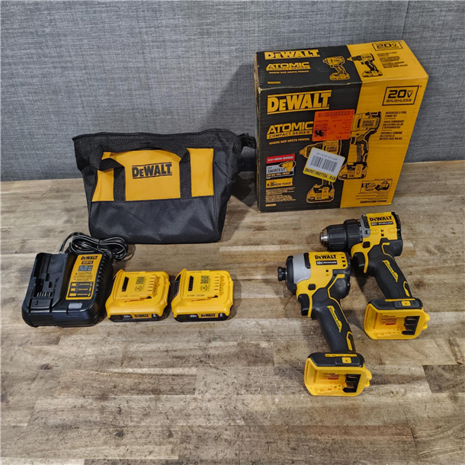 HOUSTON LOCATION - AS-IS Dewalt DCK225D2 20V MAX ATOMIC Brushless Compact Lithium-Ion 1/2 in. Cordless Drill Driver and 1/4 in. Impact Driver Combo Kit with 2 Batteries 2 Ah
