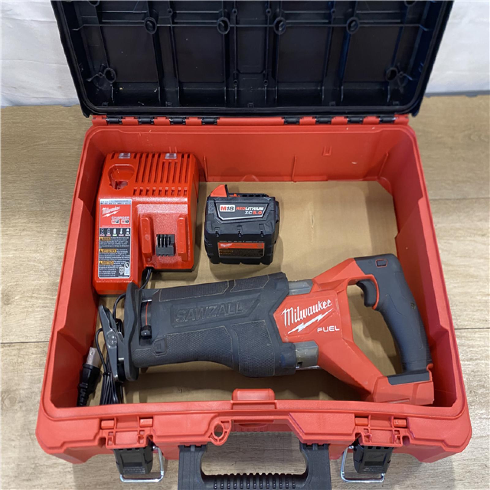 AS-IS MILWAUKEE M18 FUEL18V Lithium-Ion Brushless Cordless SAWZALL Reciprocating Saw with PACKOUT Tool-Box  (1) 5.0 Battery  and Charger