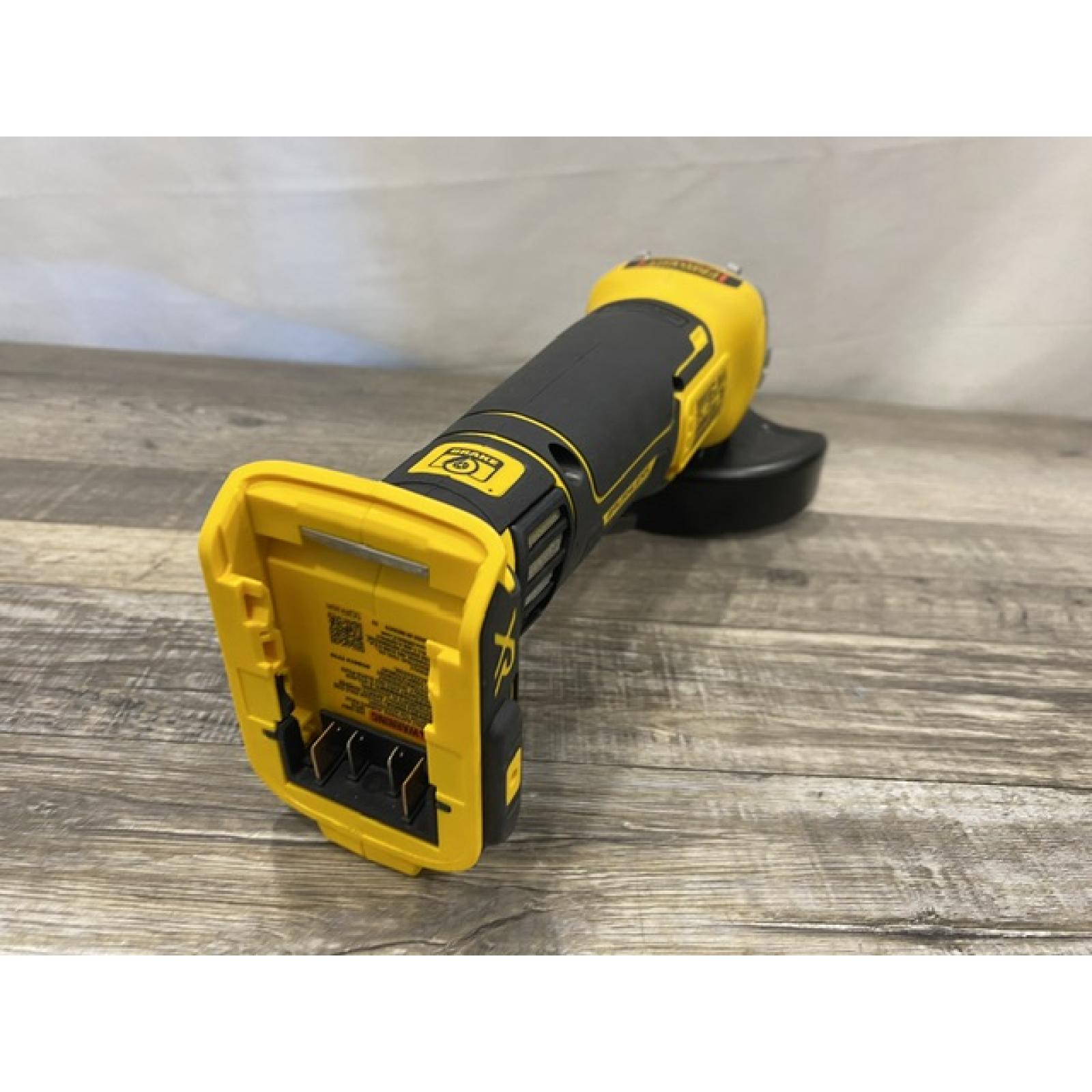 AS-IS DEWALT 20V MAX XR Cordless Brushless 4.5 in. Paddle Switch Small Angle Grinder with Kickback Brake (Tool Only)