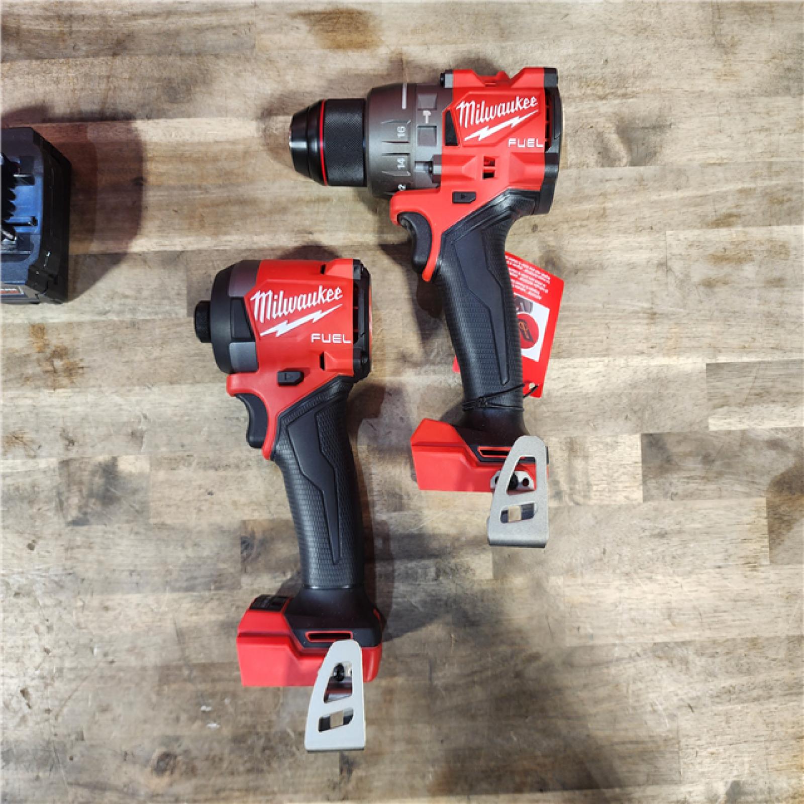 HOUSTON LOCATION - AS-IS (APPEARS LIKE NEW) MILWAUKEE FUEL 18V Lithium-Ion Brushless Cordless Hammer Drill and Impact Driver Combo Kit (2-Tool) with 2 Batteries