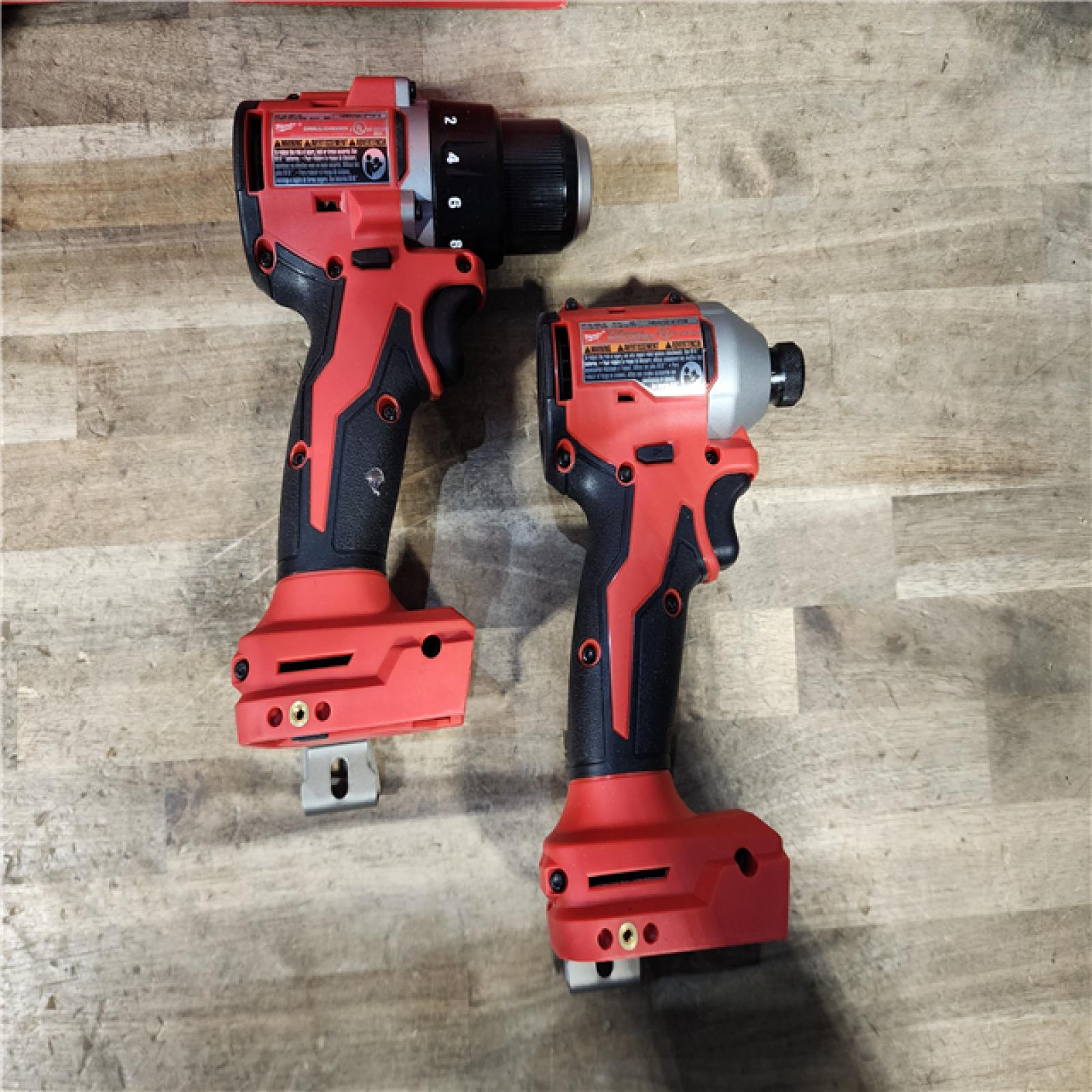 HOUSTON LOCATION - AS-IS Milwaukee M18 18V Lithium-Ion Brushless Cordless Compact Drill/Impact Combo Kit (2-Tool) W/(2) 2.0 Ah Batteries  Charger & Bag