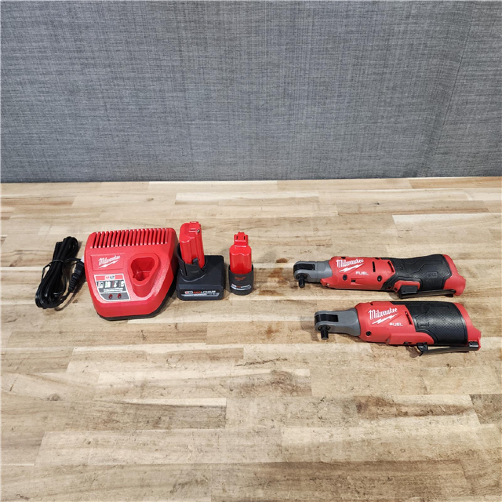 HOUSTON LOCATION - AS-IS Milwaukee 2 Tool Combo Kit W/ (2) Battery & Charger