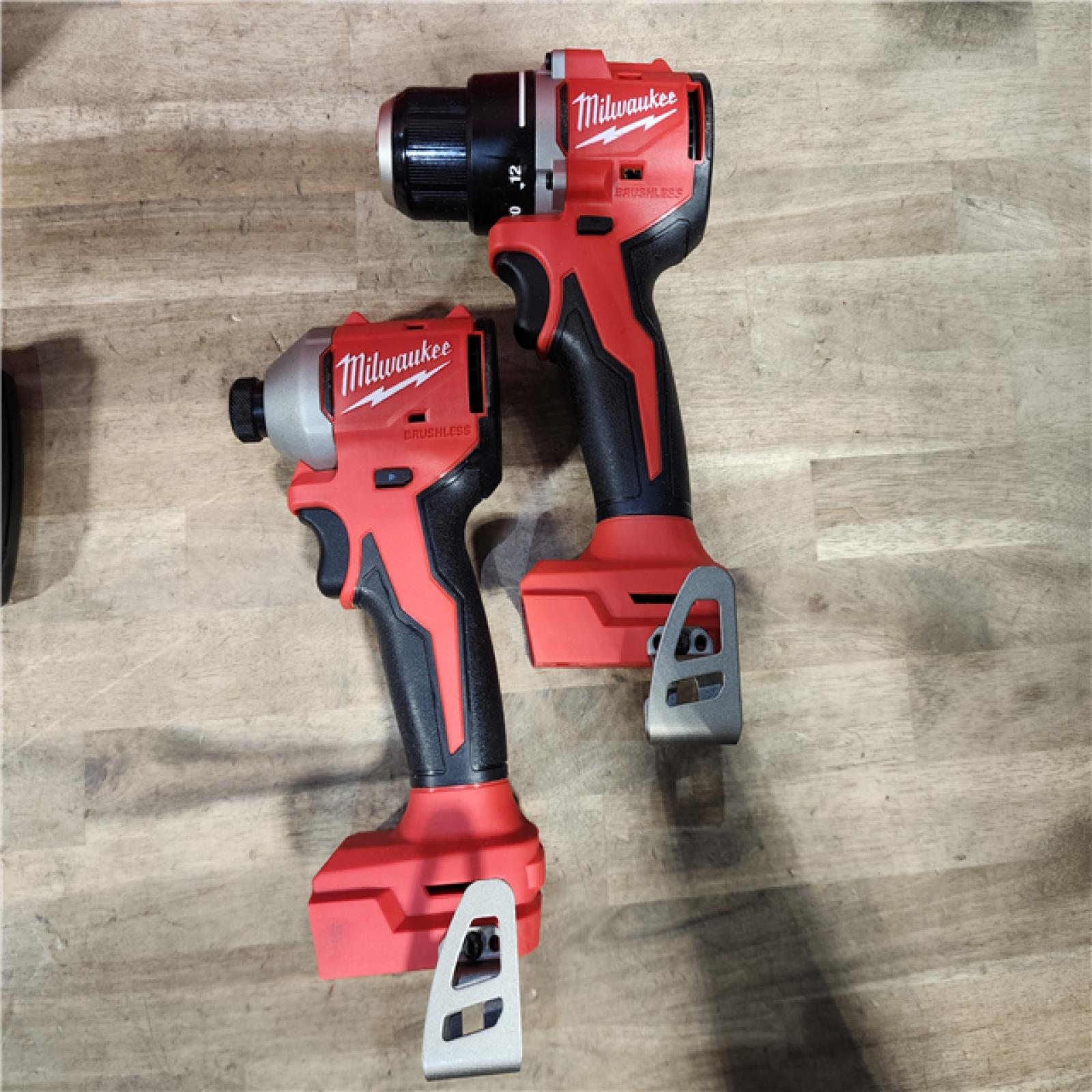 HOUSTON LOCATION - AS-IS Milwaukee M18 18V Lithium-Ion Brushless Cordless Compact Drill/Impact Combo Kit (2-Tool) W/(2) 2.0 Ah Batteries, Charger & Bag