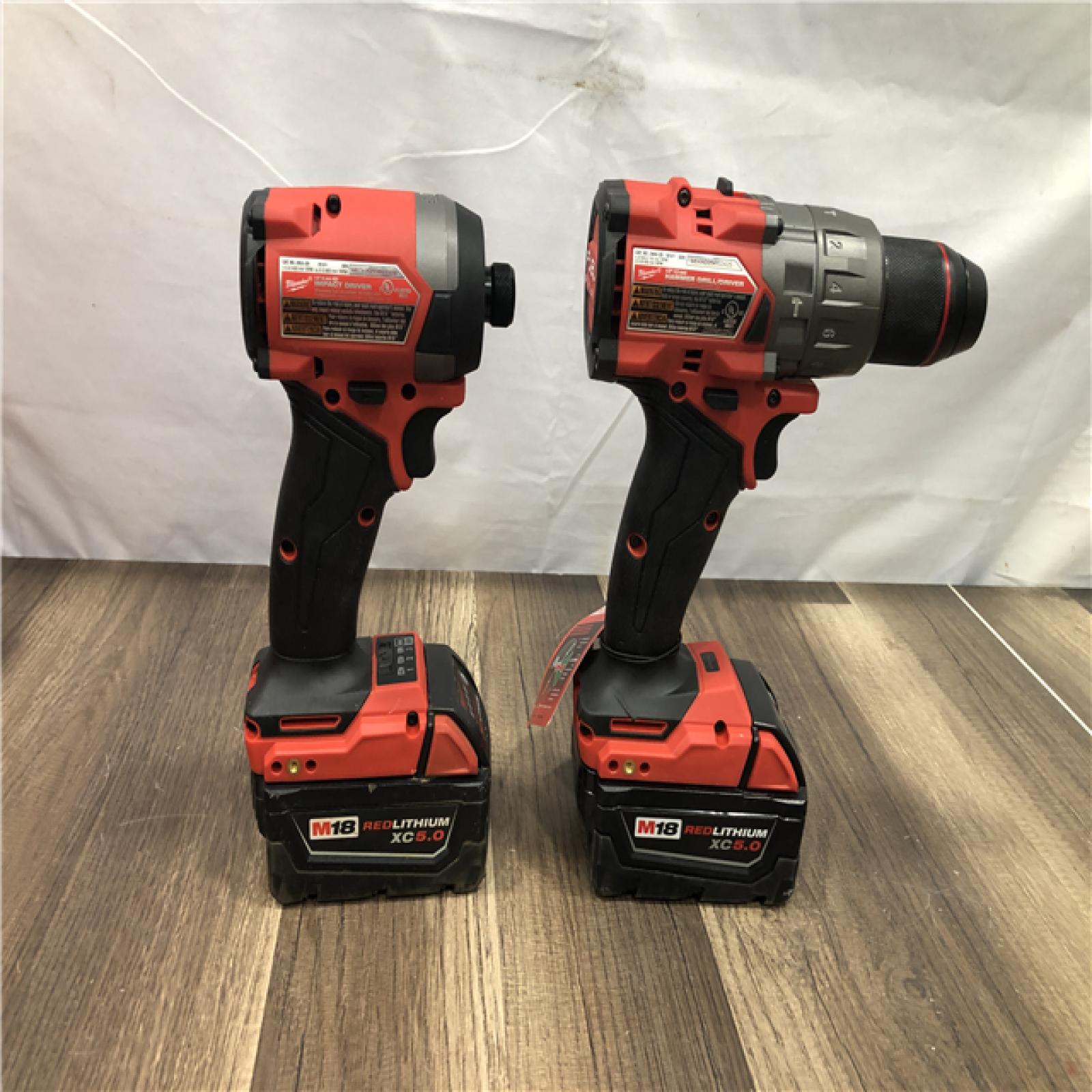 AS-IS Milwaukee FUEL 18V Lithium-Ion Brushless Cordless Hammer Drill and Impact Driver Combo Kit