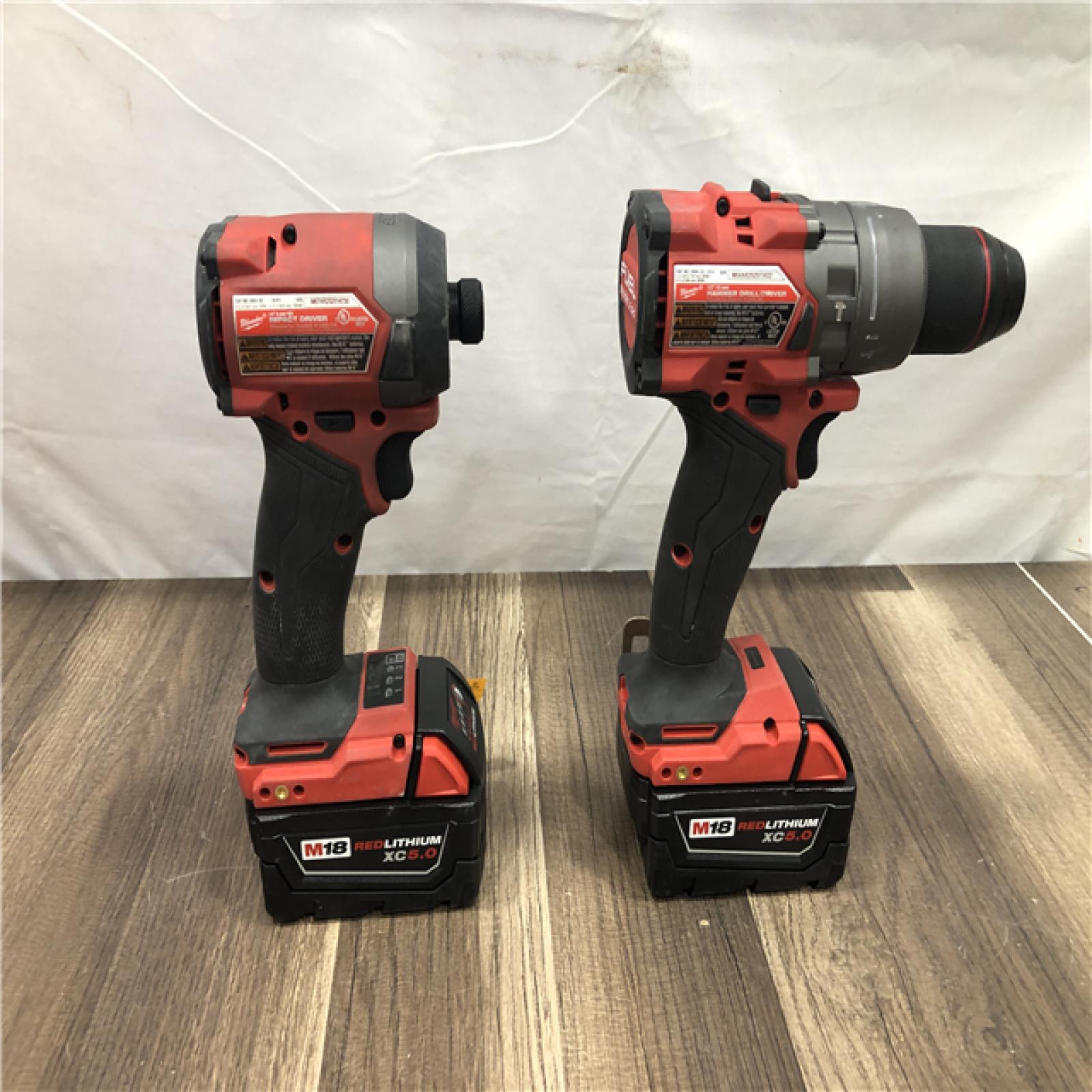 AS-IS Milwaukee FUEL 18V Lithium-Ion Brushless Cordless Hammer Drill and Impact Driver Combo Kit
