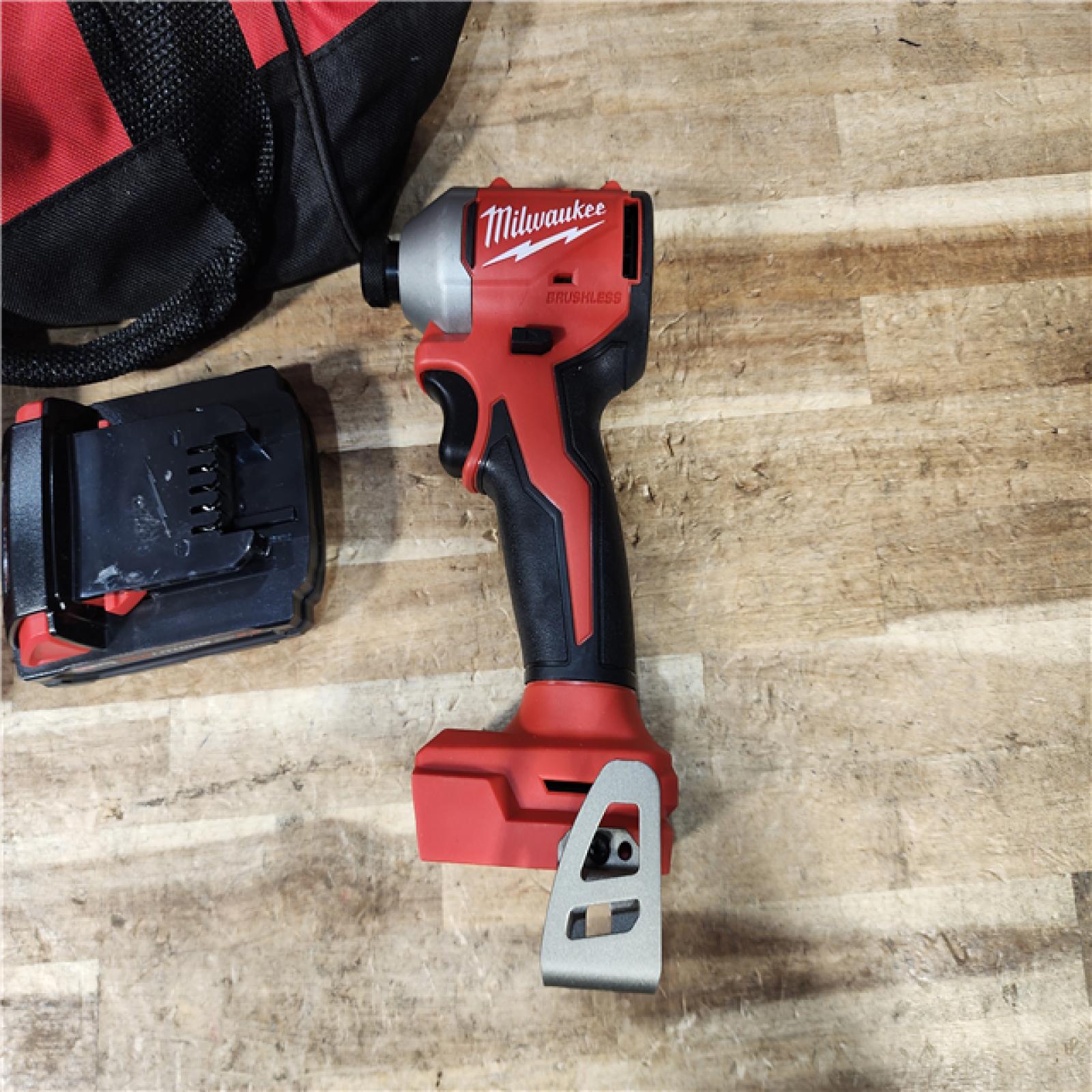 HOUSTON LOCATION - AS - IS Milwaukee  18V Lithium-Ion Brushless Cordless 1/4 in. Compact Impact Driver COMBO KIT