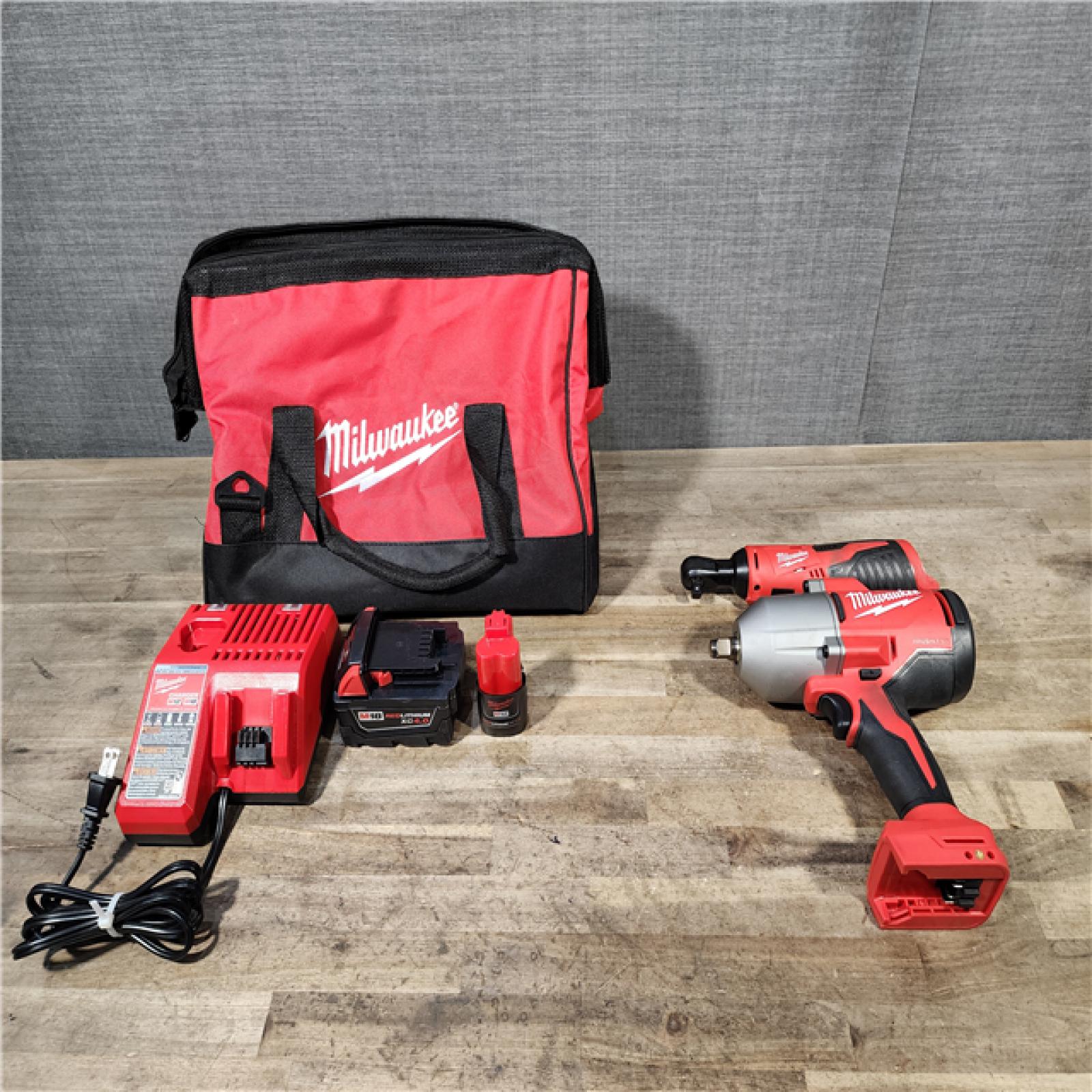 HOUSTON LOCATION - AS-IS MILWAUKEE 2 TOOL COMBO KIT W/ (2) BATTERY & CHARGER