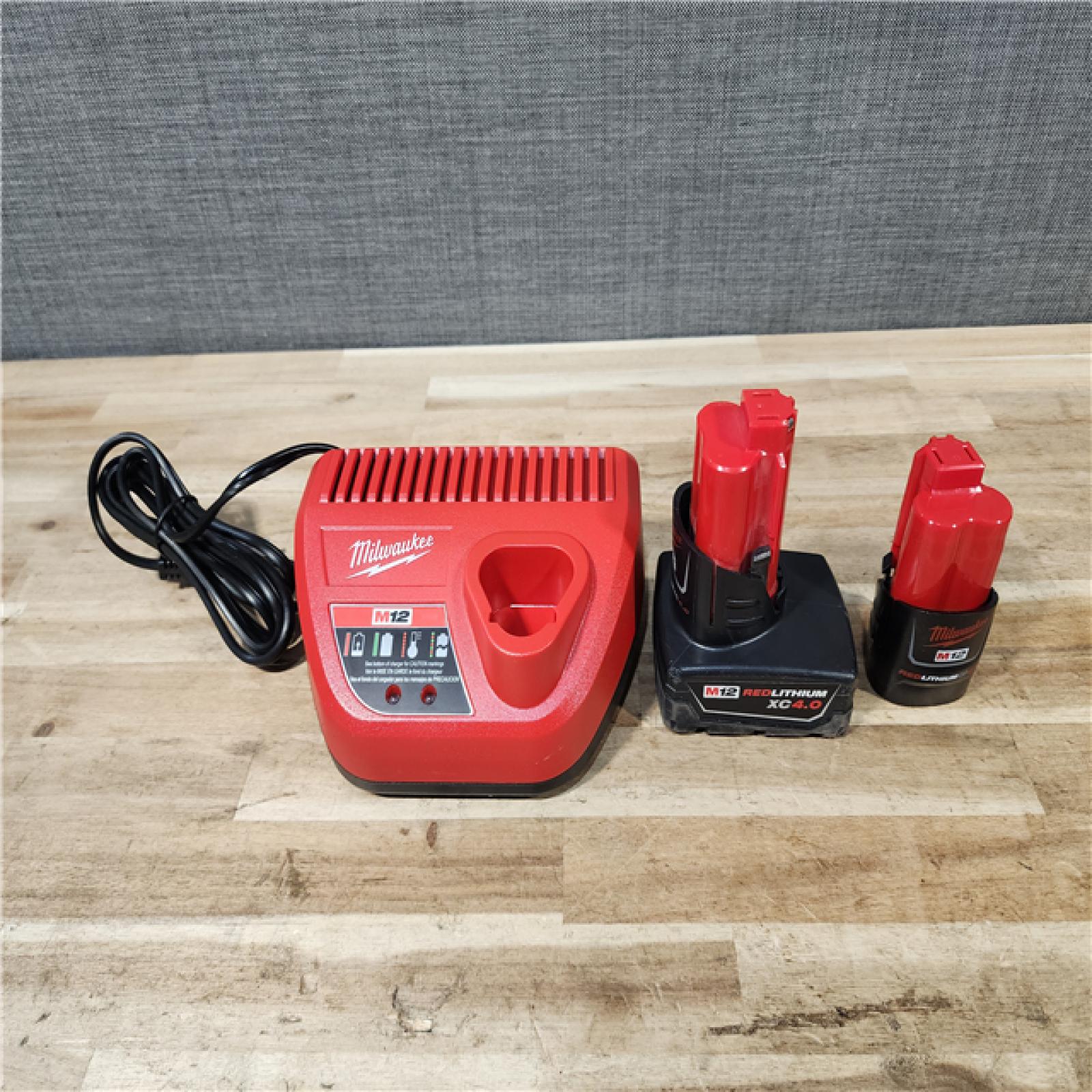HOUSTON LOCATION - AS-IS Milwaukee FUEL 12-Volt Lithium-Ion Brushless Cordless Hammer Drill and Impact Driver Combo Kit