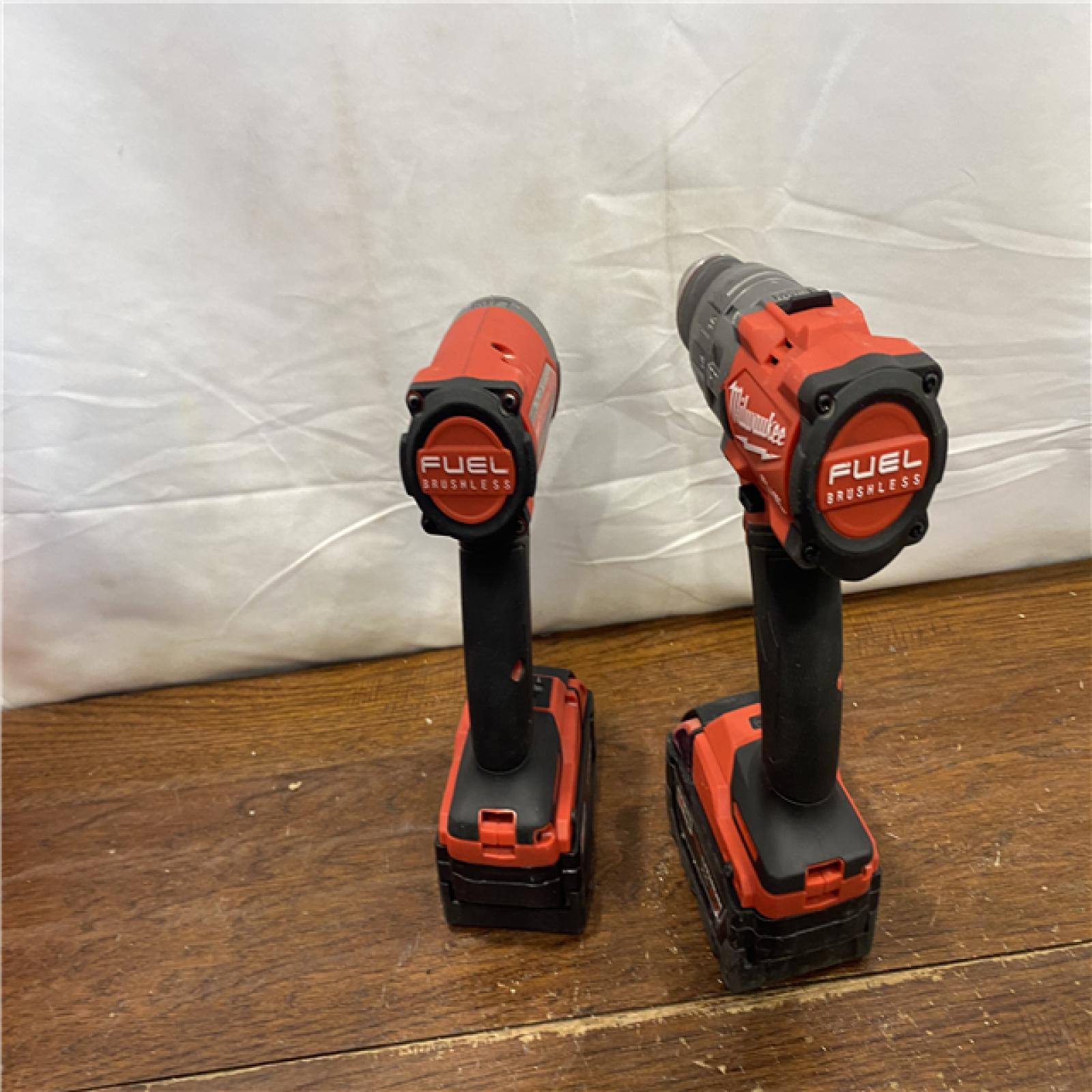 AS-IS MILWAUKEE M18 FUEL 18V Lithium-Ion Brushless Cordless Hammer Drill and Impact Driver Combo Kit (2-Tool) with 2 Batteries