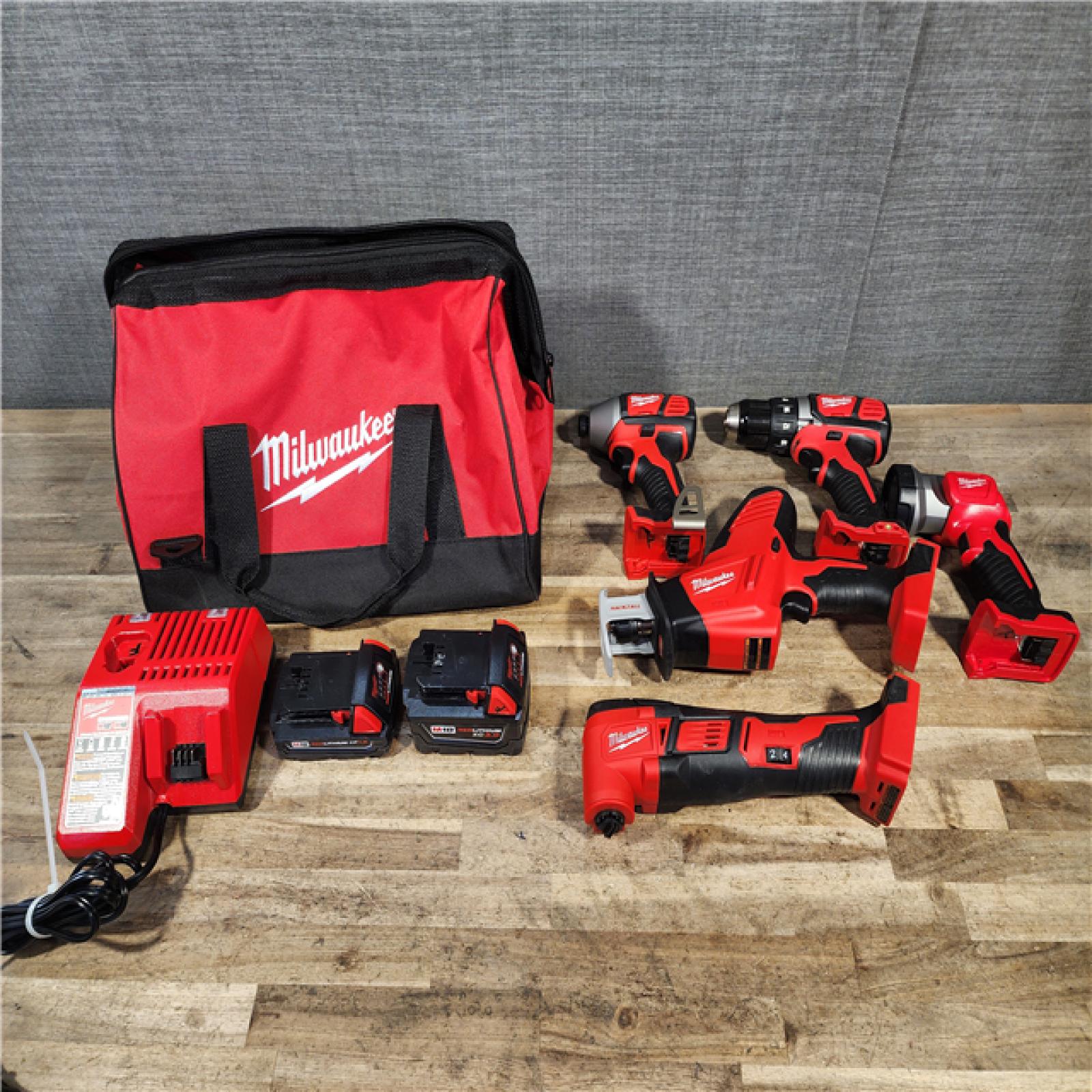 HOUSTON LOCATION - AS-IS M18 18V Lithium-Ion Cordless Combo Kit (5-Tool) with (2) Batteries, Charger and Tool Bag