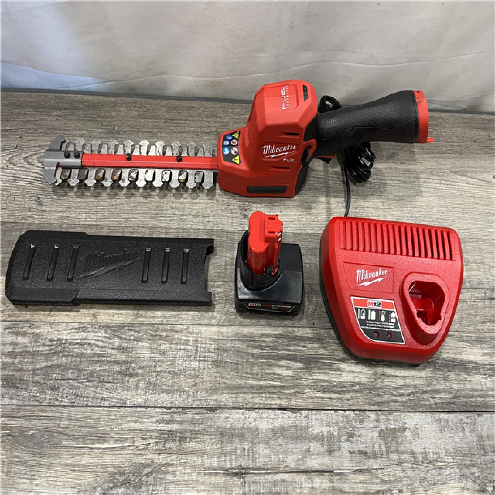 AS-IS Milwaukee FUEL 8 in. 12V Lithium-Ion Brushless Cordless Hedge Trimmer Kit