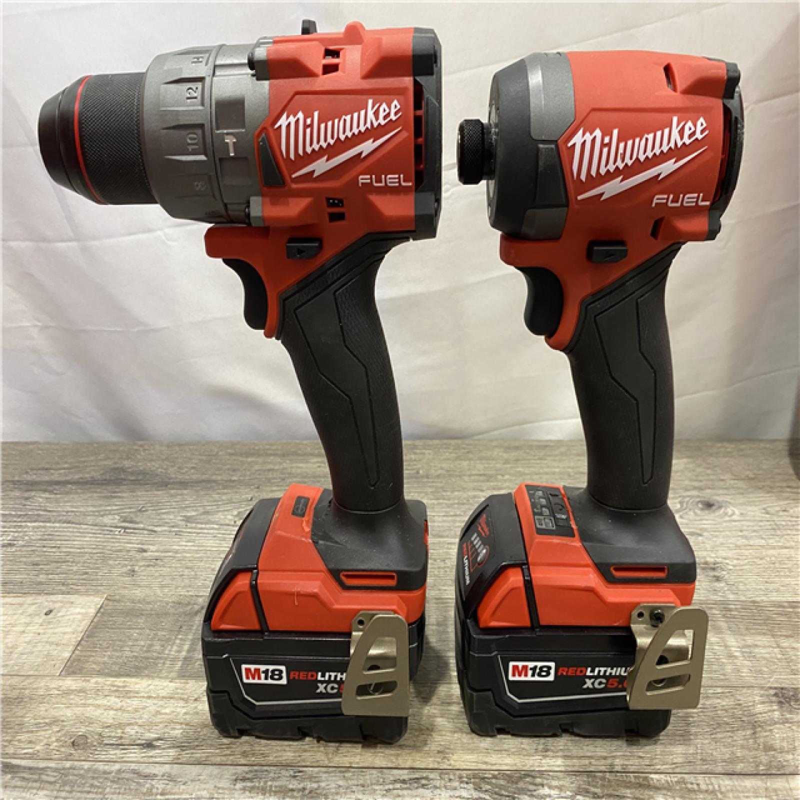 AS-IS Milwaukee FUEL 18V Lithium-Ion Brushless Cordless Hammer Drill and Impact Driver Combo Kit