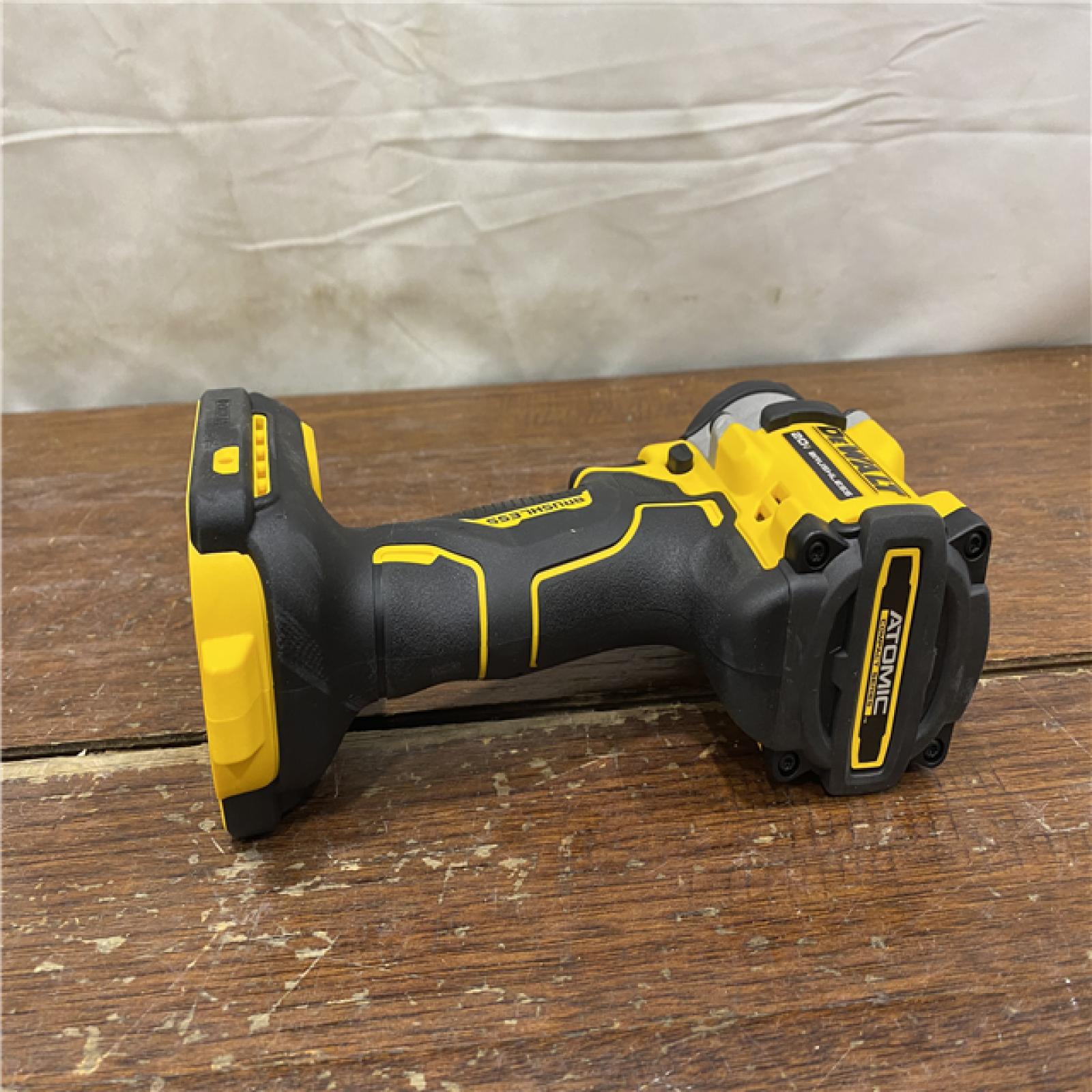 AS-IS ATOMIC 20V MAX Lithium-Ion Brushless Cordless 1/2 in. Variable Speed Impact Wrench Kit with 5 Ah Battery and Charger