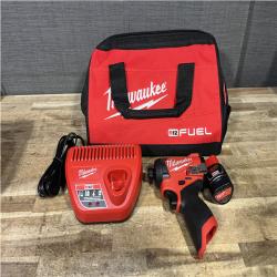 Houston Location AS-IS Milwaukee FUEL Impact Driver and Battery with Charger