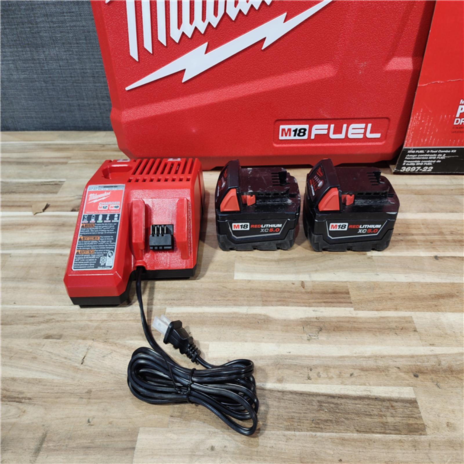 HOUSTON LOCATION - AS-IS Milwaukee  FUEL 18V Lithium-Ion Brushless Cordless Hammer Drill and Impact Driver Combo Kit