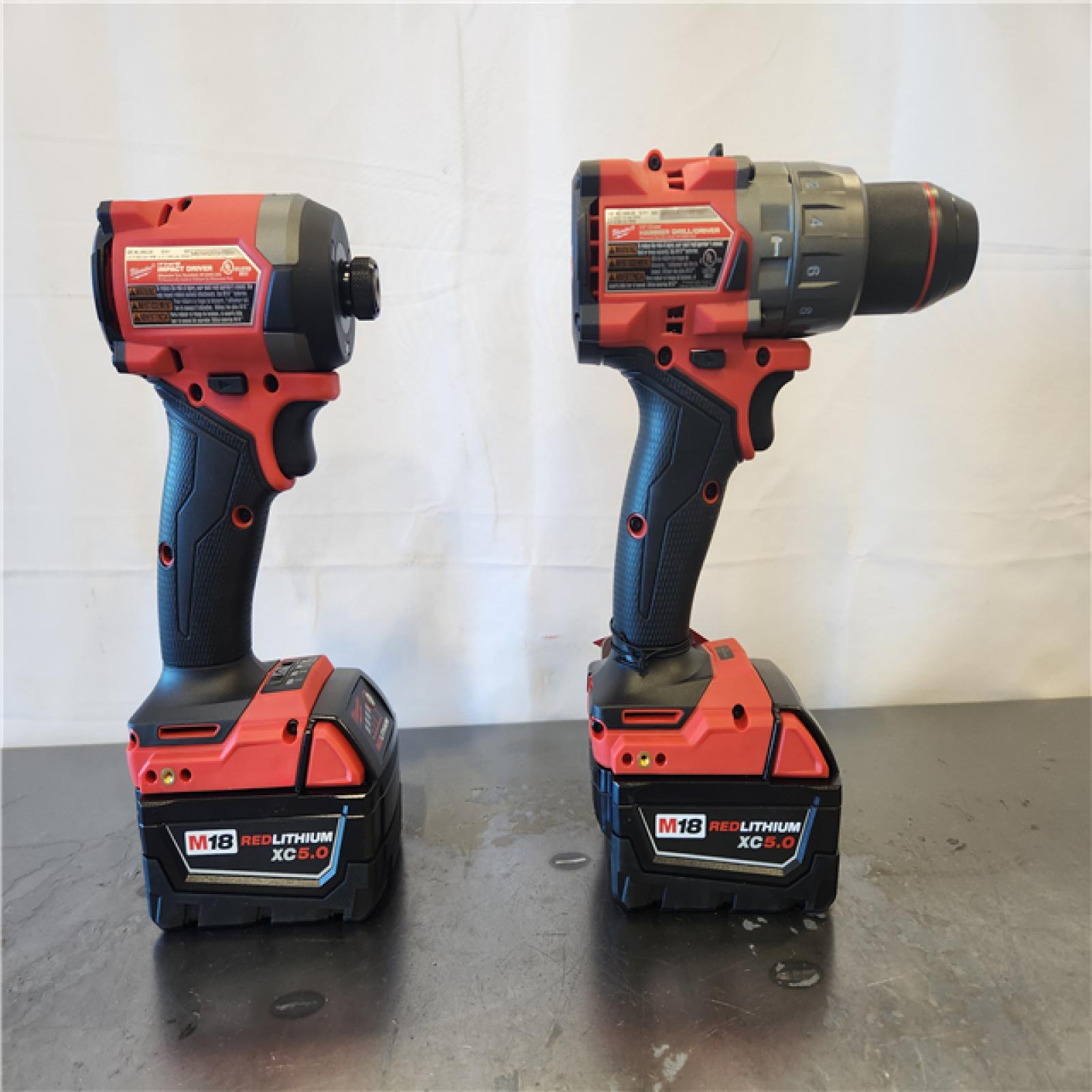 AS-IS- Milwaukee FUEL 18V Lithium-Ion Brushless Cordless Hammer Drill and Impact Driver Combo Kit