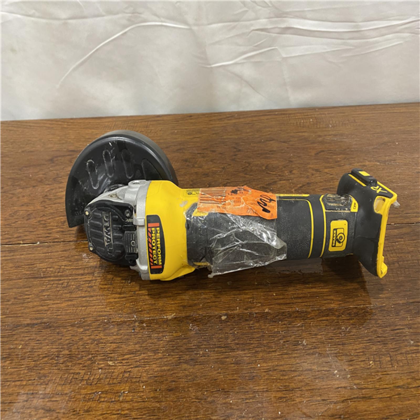 AS-IS DeWalt DCG405B 20V Max XR 4.5-Inch Slide Switch Small Angle Grinder (Tool Only)