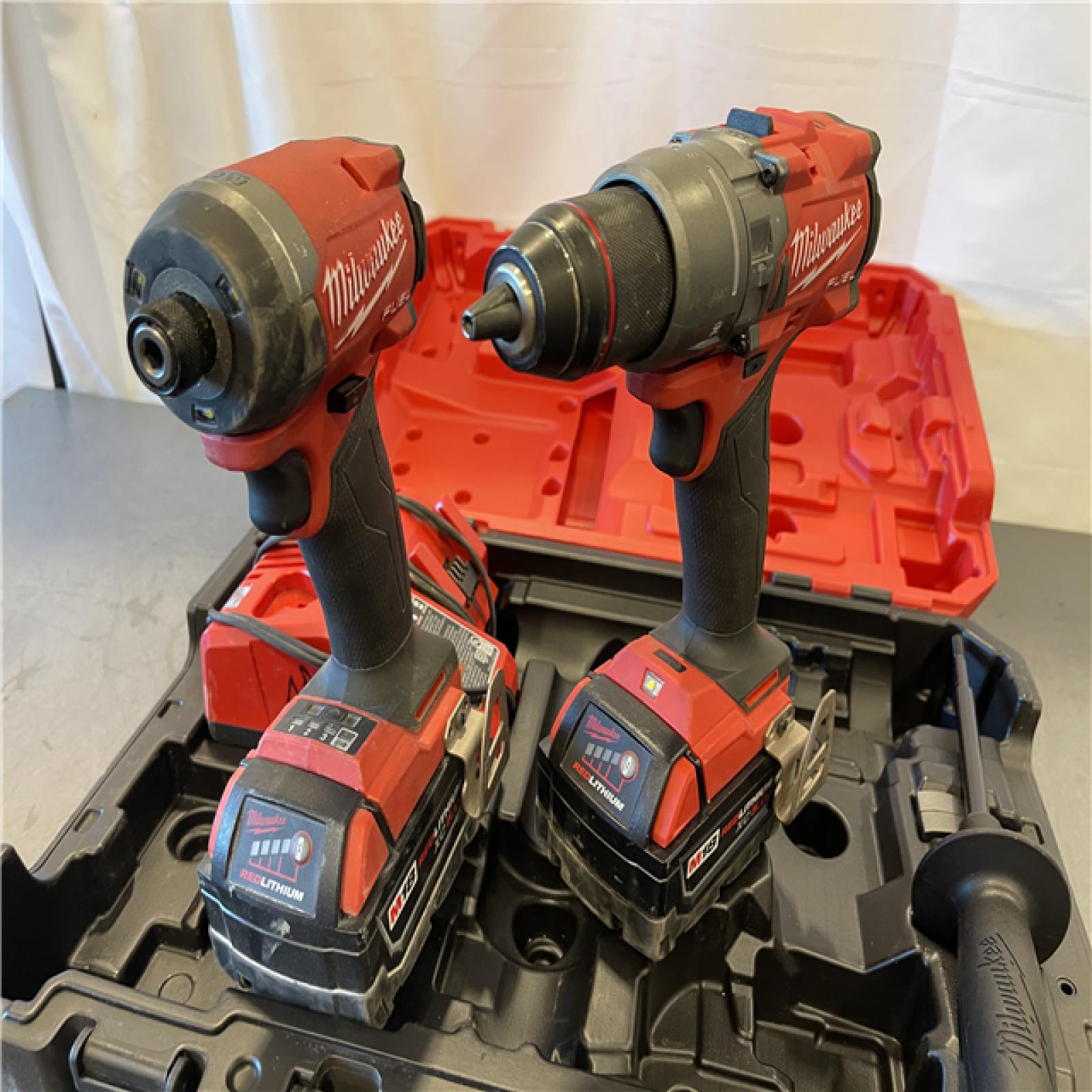 AS-IS - MILWAUKEE FUEL 18V Lithium-Ion Brushless Cordless Hammer Drill and Impact Driver Combo Kit