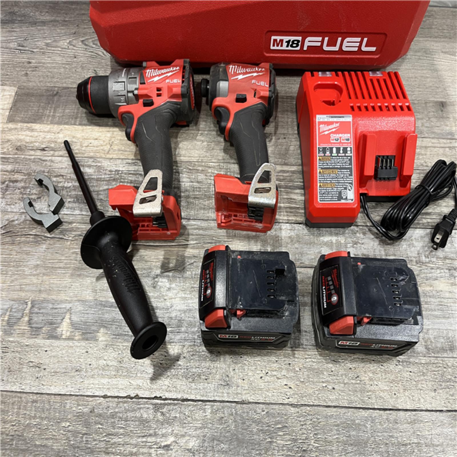 AS-IS Milwaukee FUEL 18V Lithium-Ion Brushless Cordless Hammer Drill and Impact Driver Combo Kit