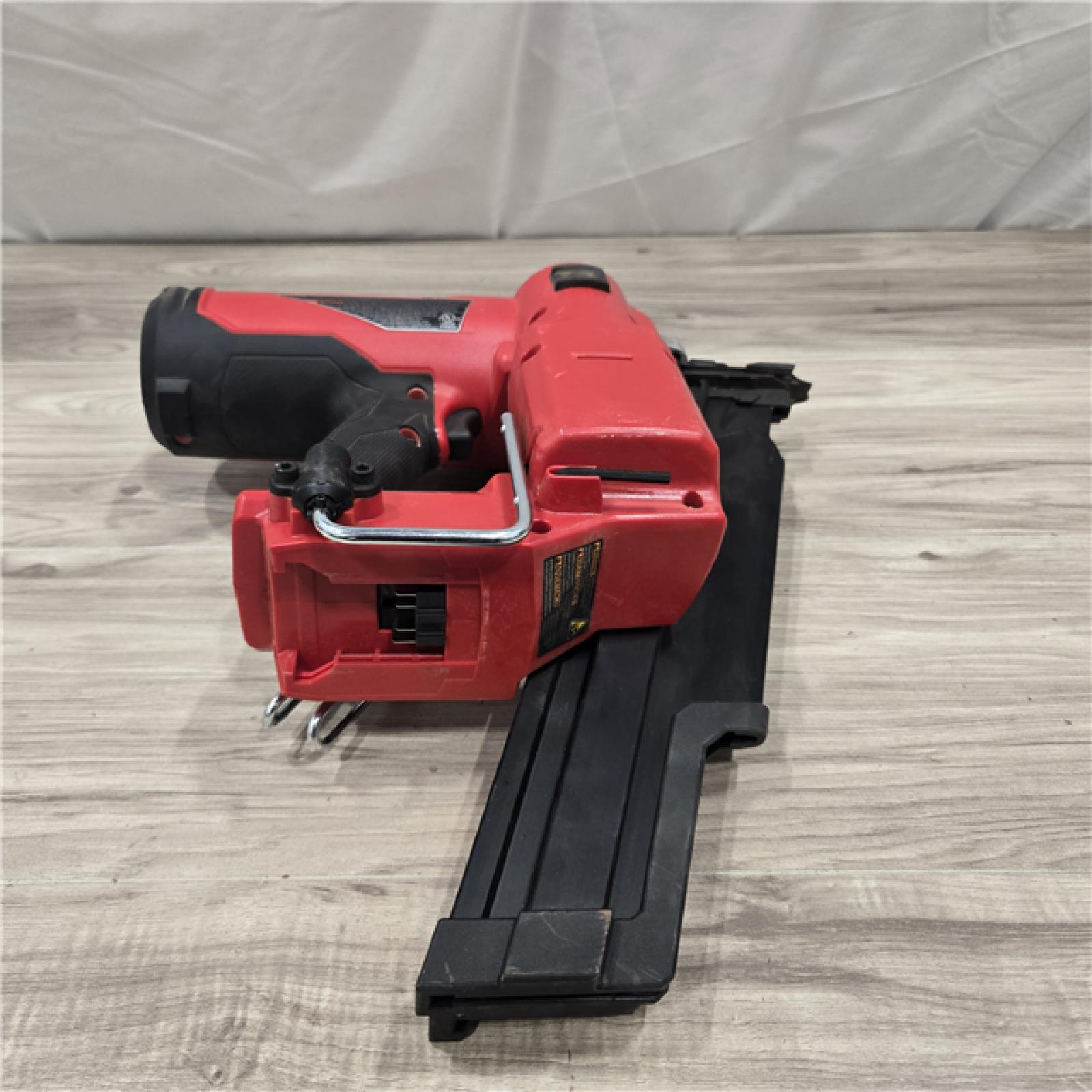 AS-IS Milwaukee 2744-20 M18 FUEL 3-1/2 in. 18V 21-Degree Cordless Framing Nailer (Tool-Only)