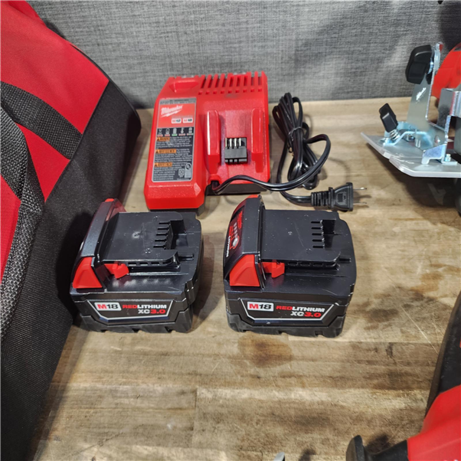 HOUSTON LOCATION - AS-IS MILWAUKEE 7 TOOL COMBO KIT W/ (2) BATTERY & CHARGER