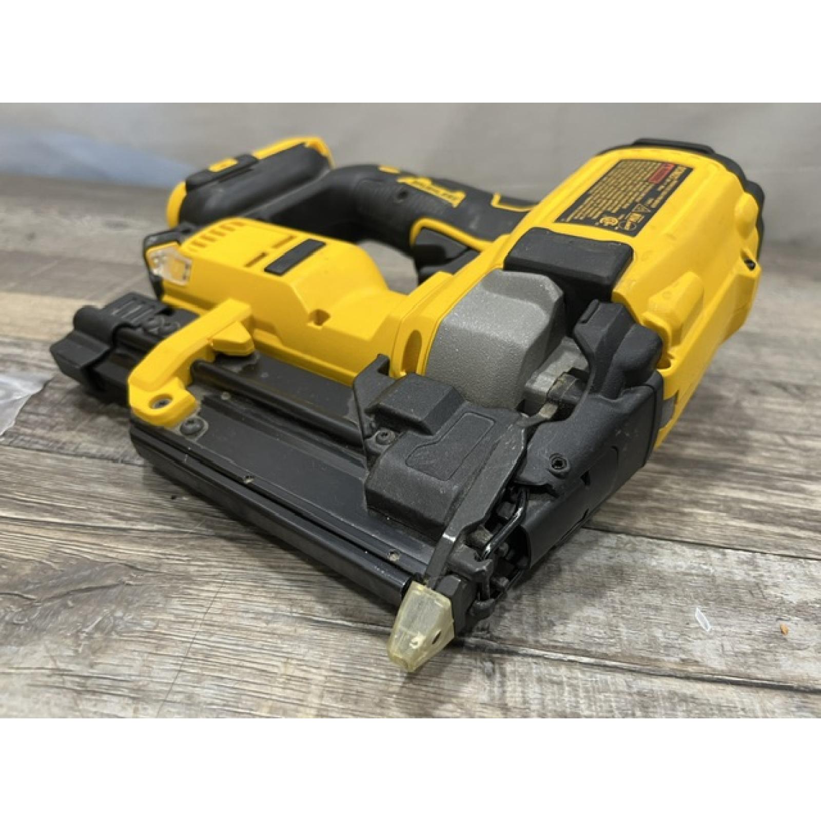 AS-IS DEWALT ATOMIC 20V MAX Lithium Ion Cordless 23 Gauge Pin Nailer (Tool Only)