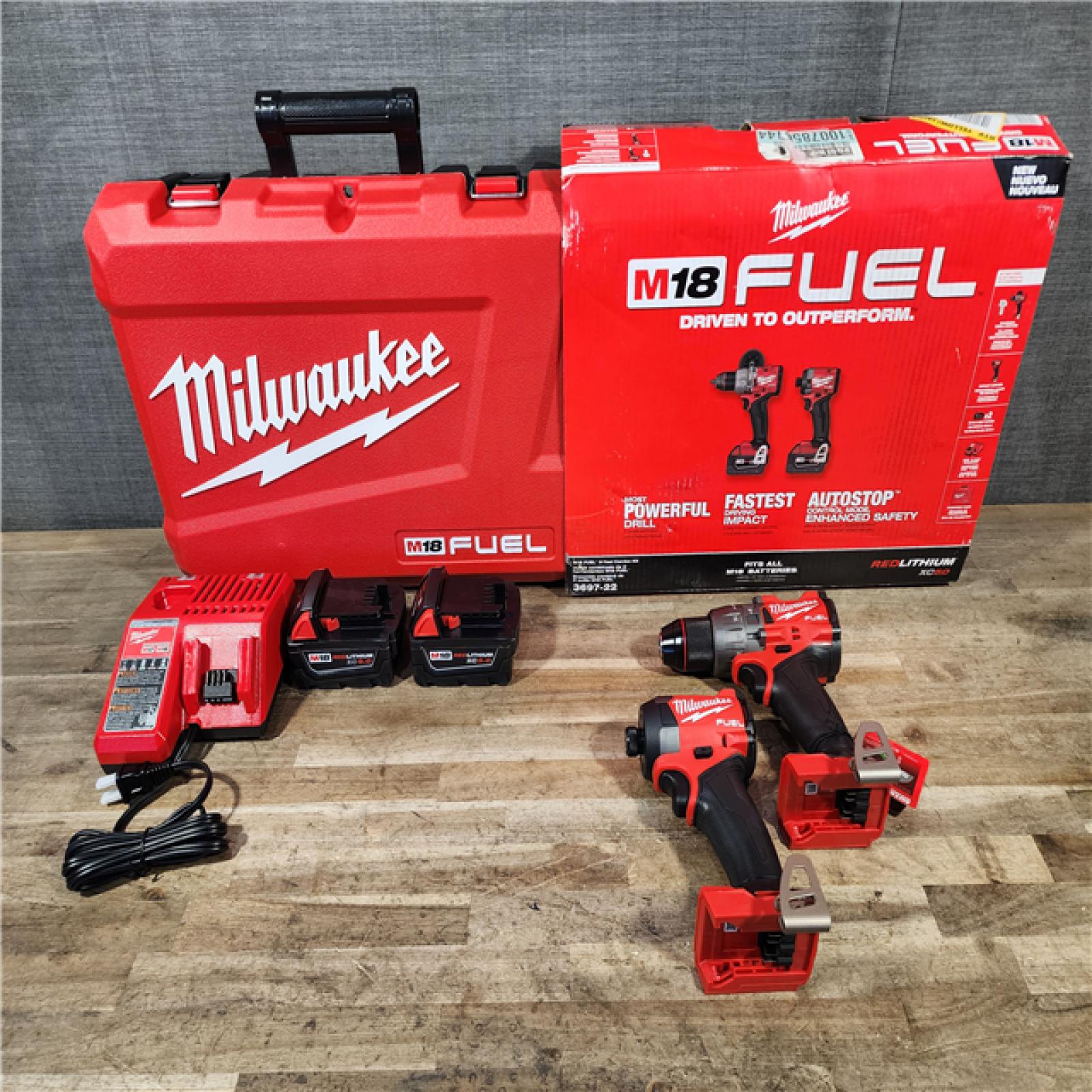 HOUSTON LOCATION - AS-IS Milwaukee FUEL 18V Lithium-Ion Brushless Cordless Hammer Drill and Impact Driver Combo Kit