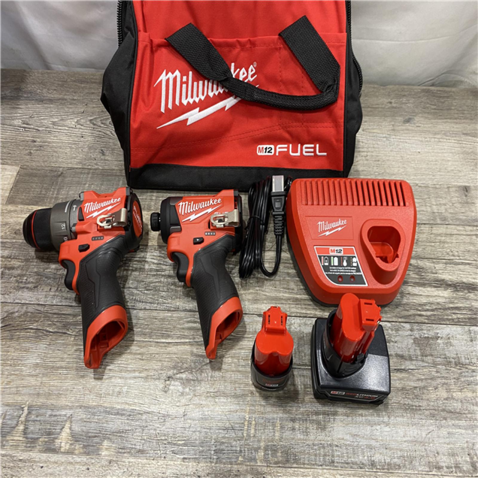AS-IS Milwaukee FUEL 12-Volt Lithium-Ion Brushless Cordless Hammer Drill and Impact Driver Combo Kit