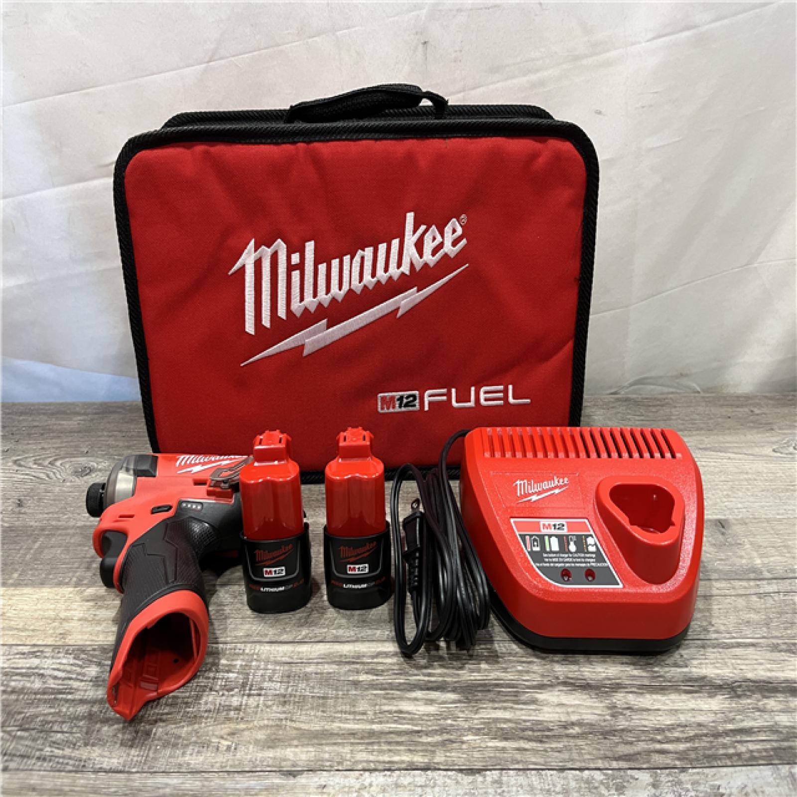 AS-IS Milwaukee FUEL SURGE 12V Lithium-Ion Brushless Cordless 1/4 in. Hex Impact Driver Compact Kit