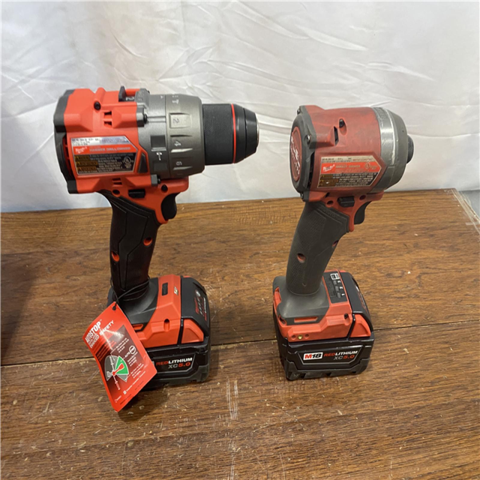 AS-IS M18 FUEL 18V Lithium-Ion Brushless Cordless Hammer Drill and Impact Driver Combo Kit (2-Tool) with 2 Batteries