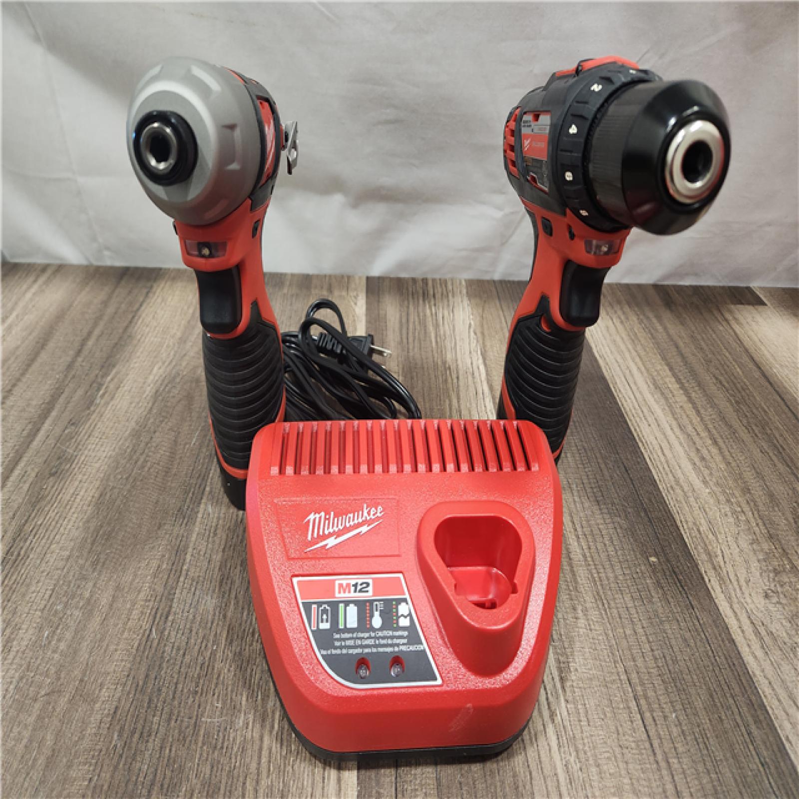 AS-IS- Milwaukee M12 Cordless Combination 3/8  Drill / Driver and 1/4  Hex Impact Driver Dual Power Tool Kit (2 Lithium Ion Batteries  Charger   and B