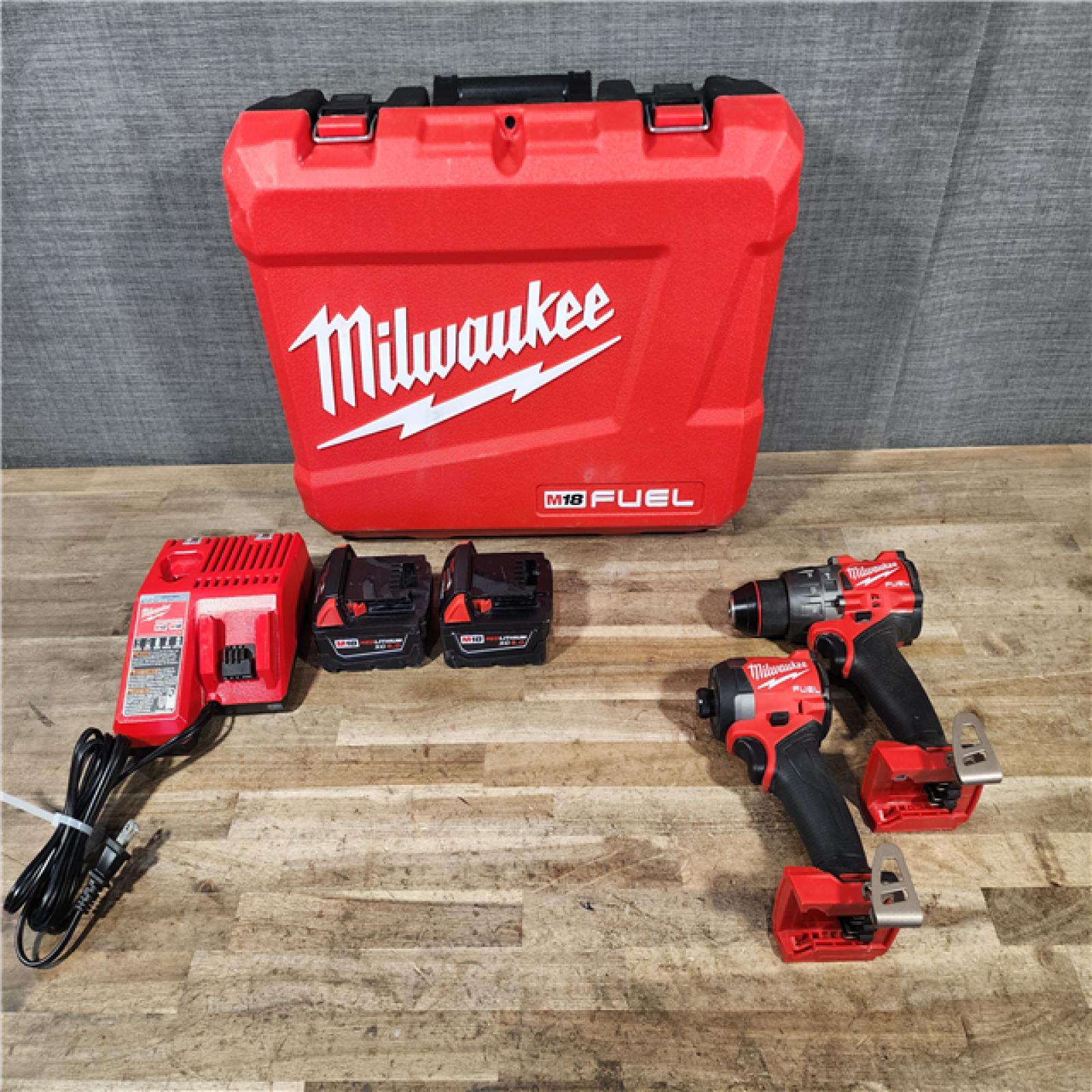 HOUSTON LOCATION - AS-IS Milwaukee FUEL 18V Lithium-Ion Brushless Cordless Hammer Drill and Impact Driver Combo Kit