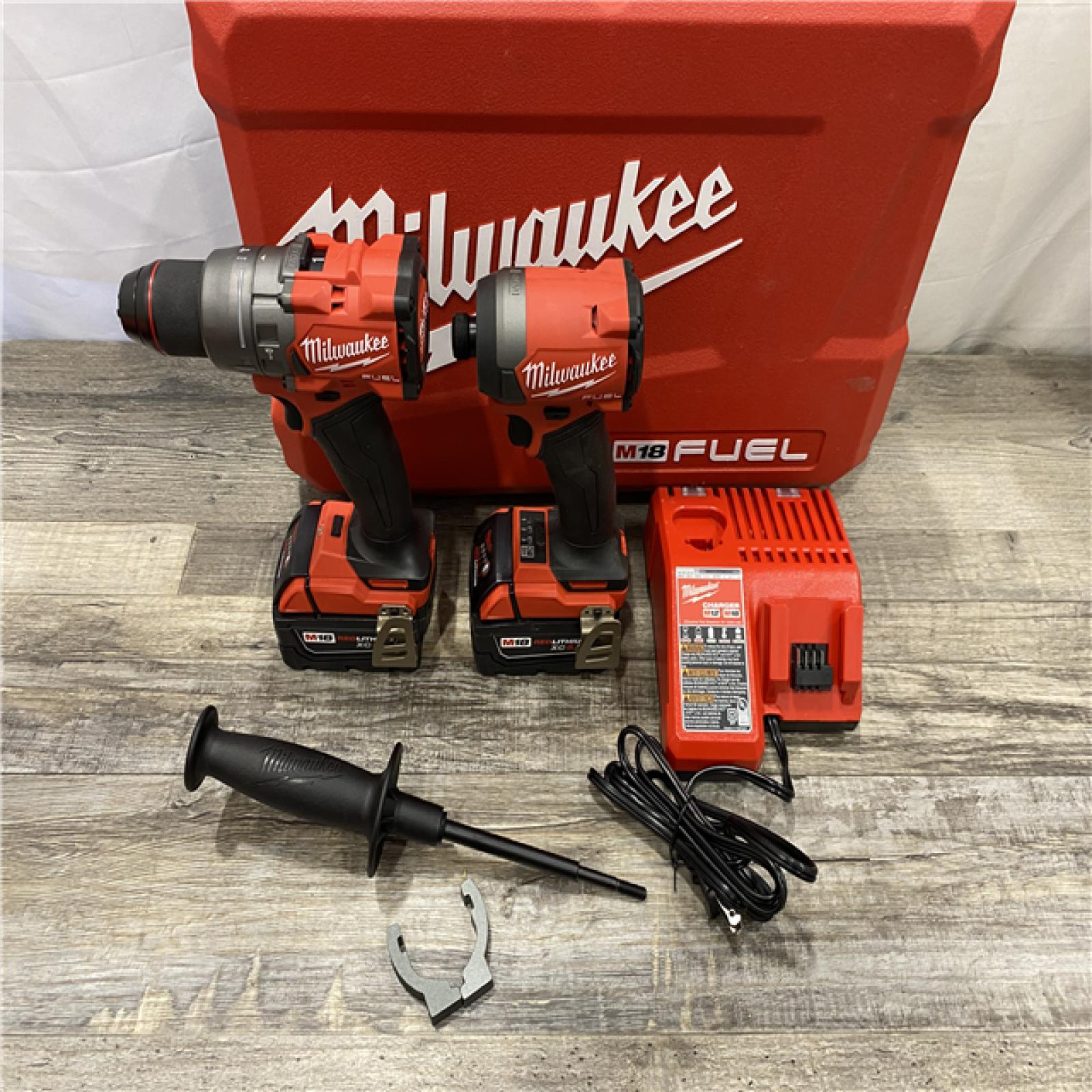 AS-IS Milwaukee FUEL 18V Lithium-Ion Brushless Cordless Hammer Drill and Impact Driver Combo Kit