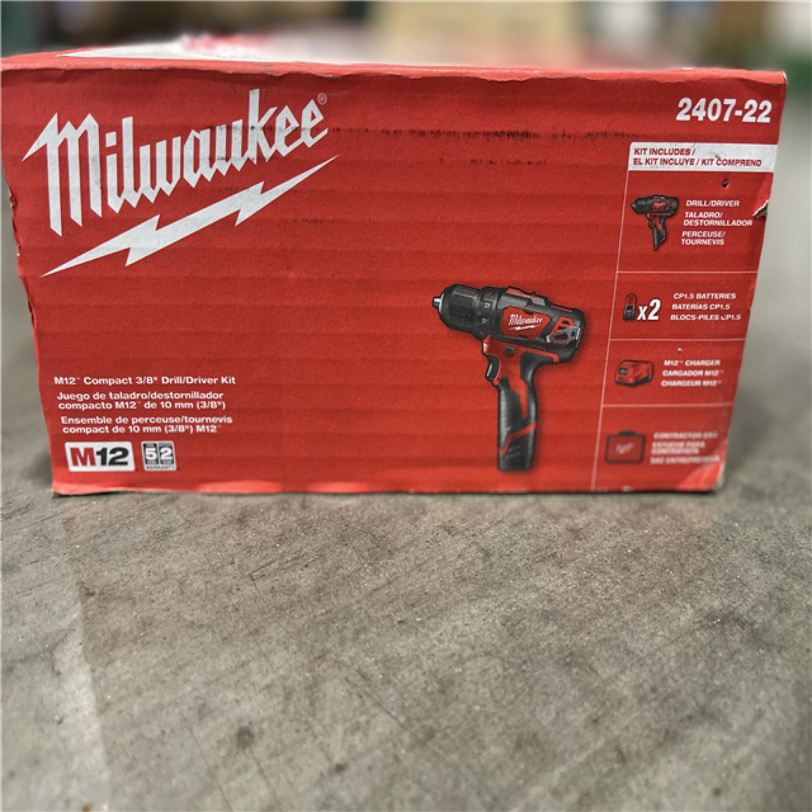 NEW! -Milwaukee M12 12V Lithium-Ion Cordless 3/8 in. Drill/Driver Kit with Two 1.5 Ah Batteries  Charger and Tool Bag