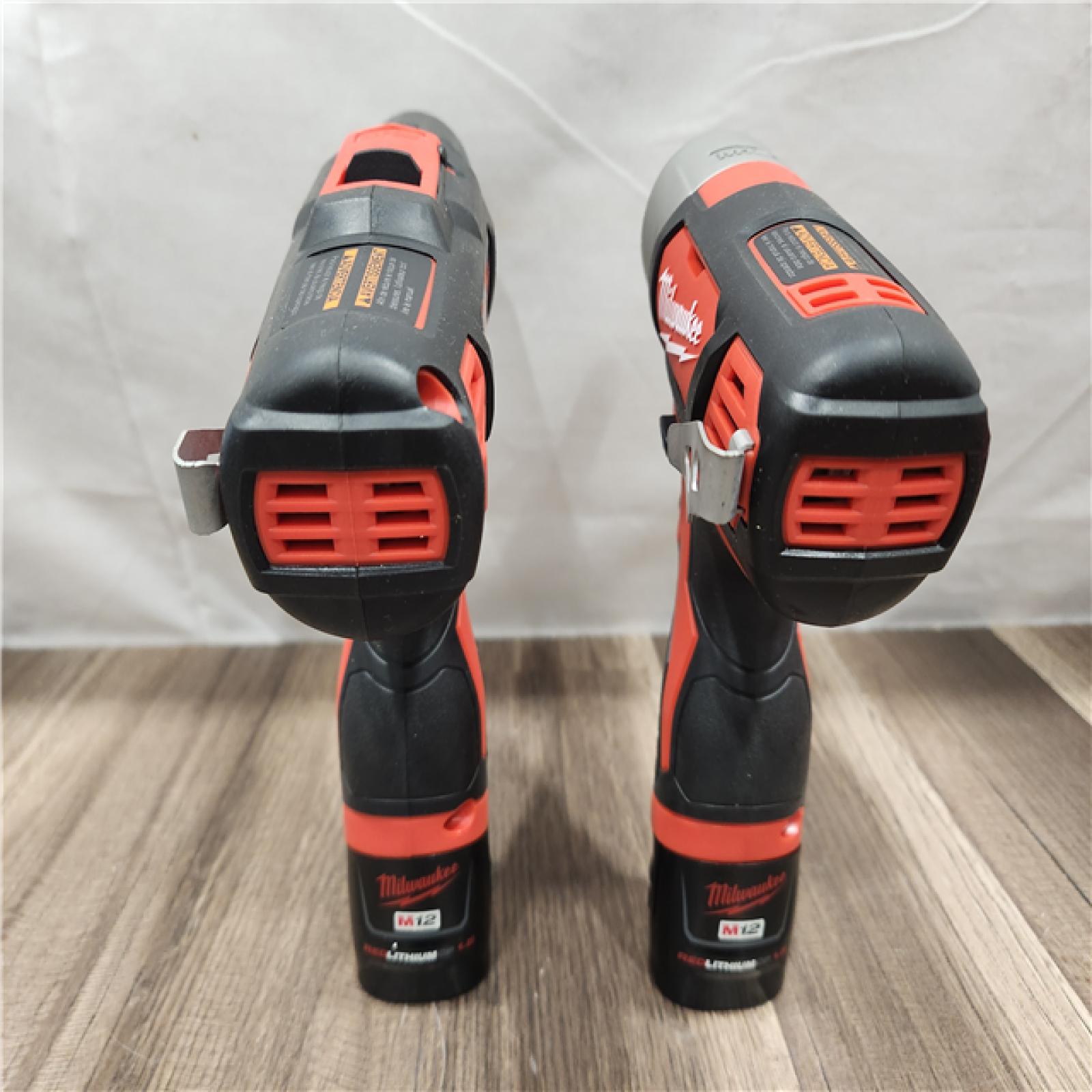 AS-IS- Milwaukee M12 Cordless Combination 3/8 Drill / Driver and 1/4 Hex Impact Driver Dual Power Tool Kit (2 Lithium Ion Batteries  Charger  and B