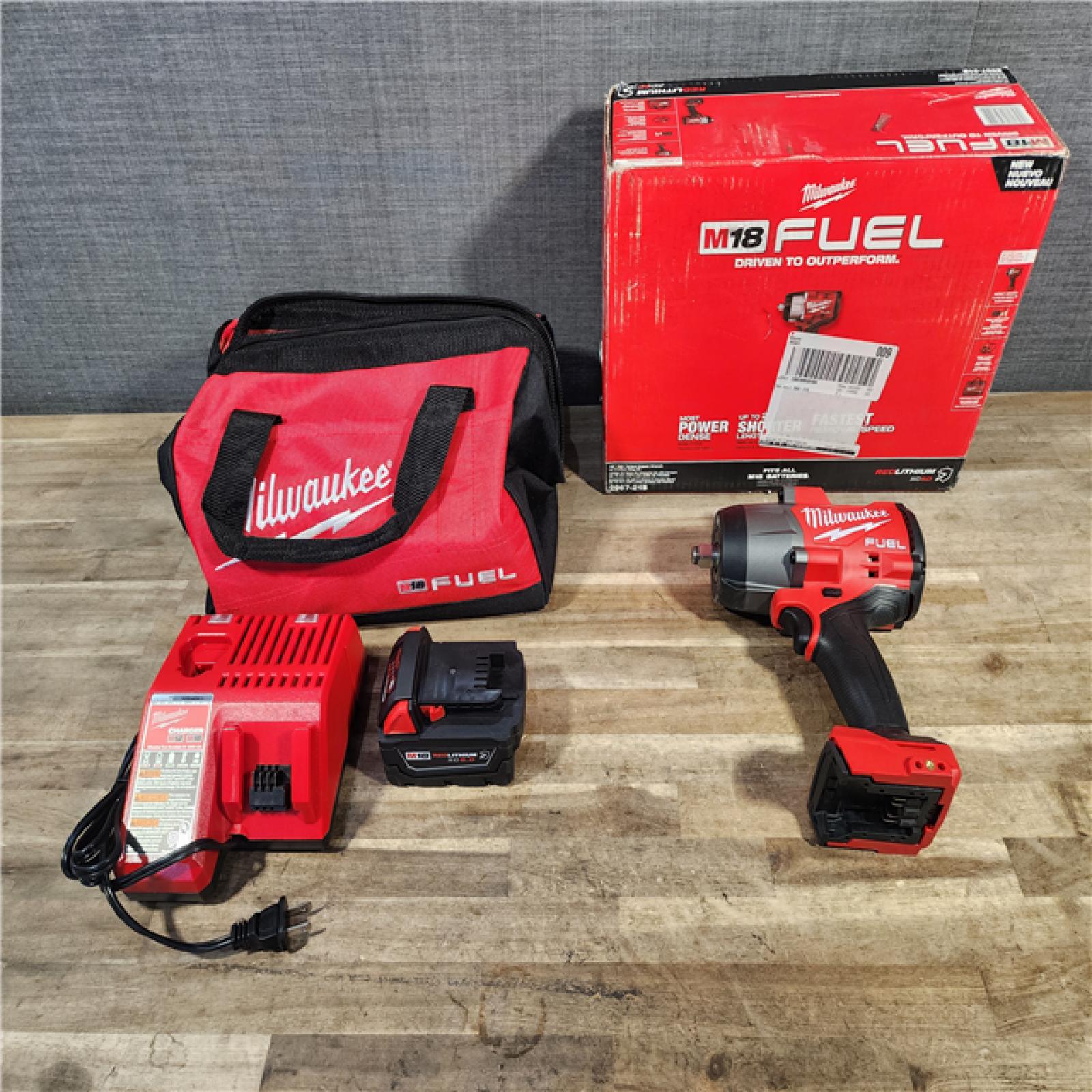 HOUSTON LOCATION - AS-IS Milwaukee M18 1/2 in. Cordless Brushless High Torque Impact Wrench Kit (Battery & Charger)