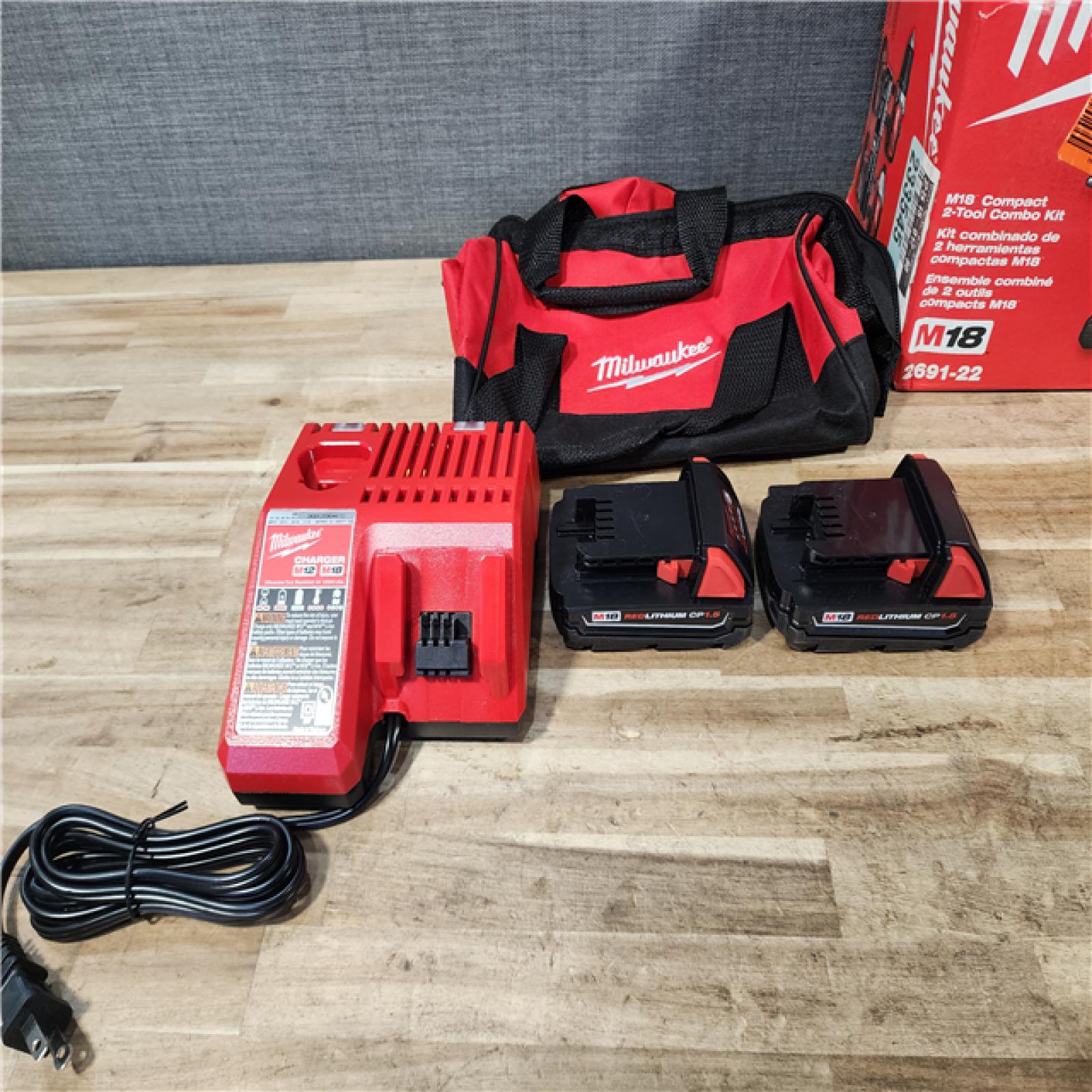 HOUSTON LOCATION - AS-IS Milwaukee 18V Lithium-Ion Cordless Drill Driver/Impact Driver Combo Kit
