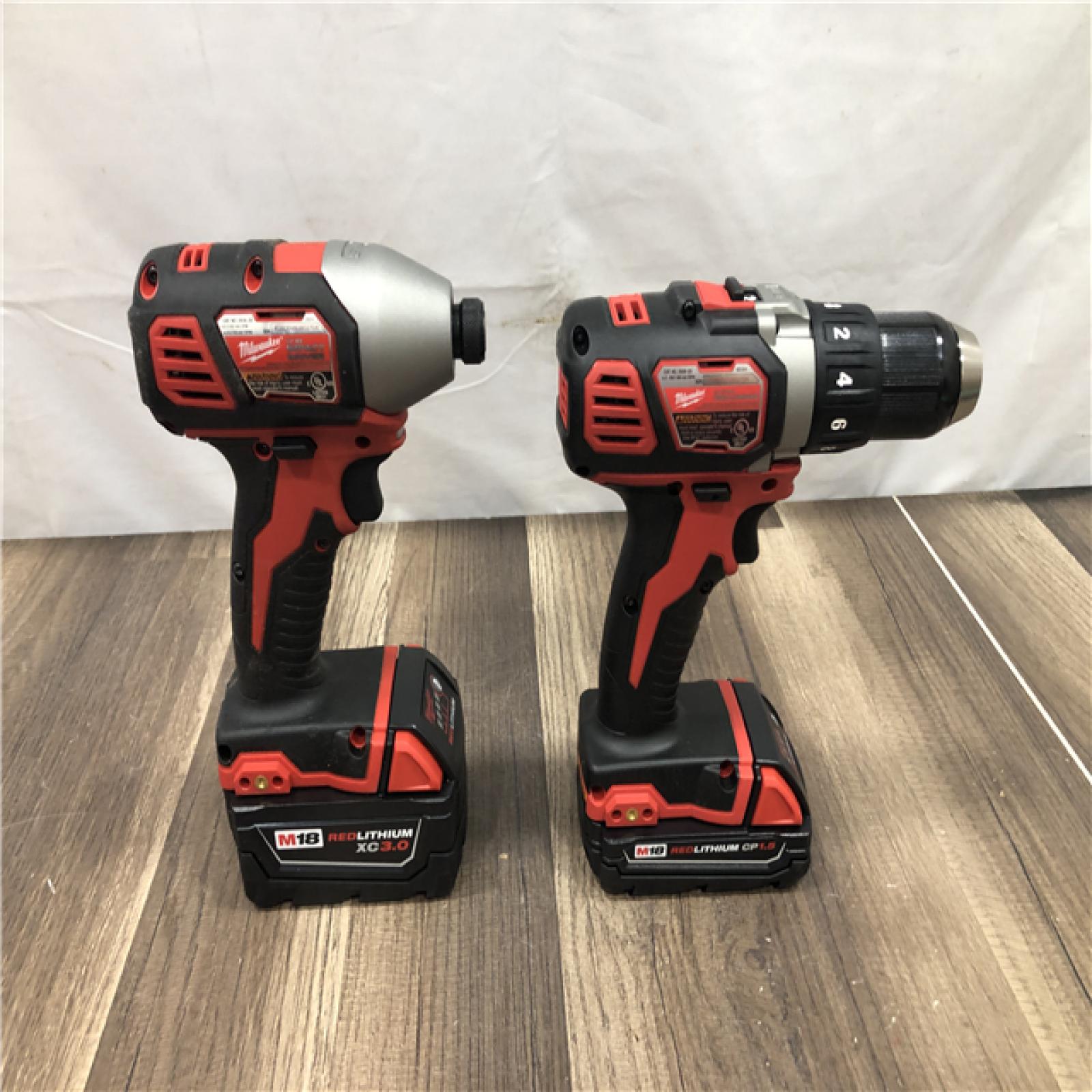 AS-IS Milwaukee M18 18V Lithium-Ion Cordless Drill Driver/Impact Driver Combo Kit