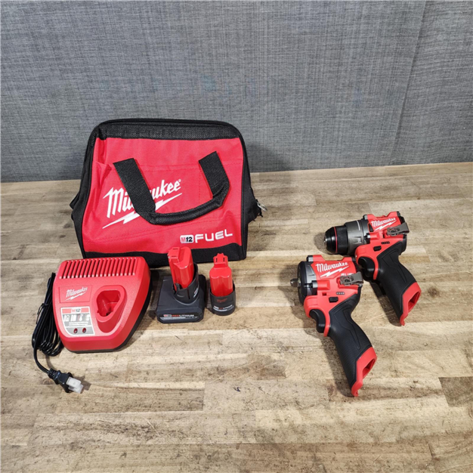 HOUSTON LOCATION - AS-IS M12 FUEL 12V Lithium-Ion Cordless Drill Driver  Impact Wrench Combo Kit (2-Tool) W/Batteries  Charger & Bag