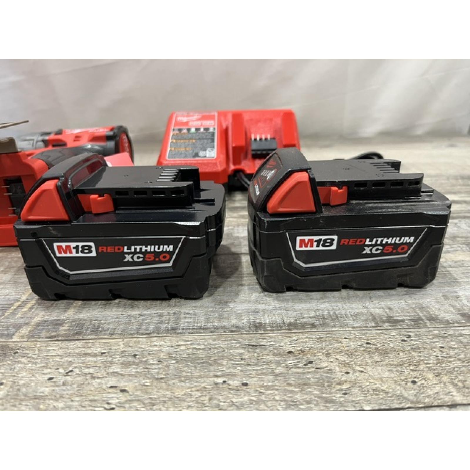 AS-IS Milwaukee FUEL 18V Lithium-Ion Brushless Cordless 1/2 in. Hammer Drill Driver Kit