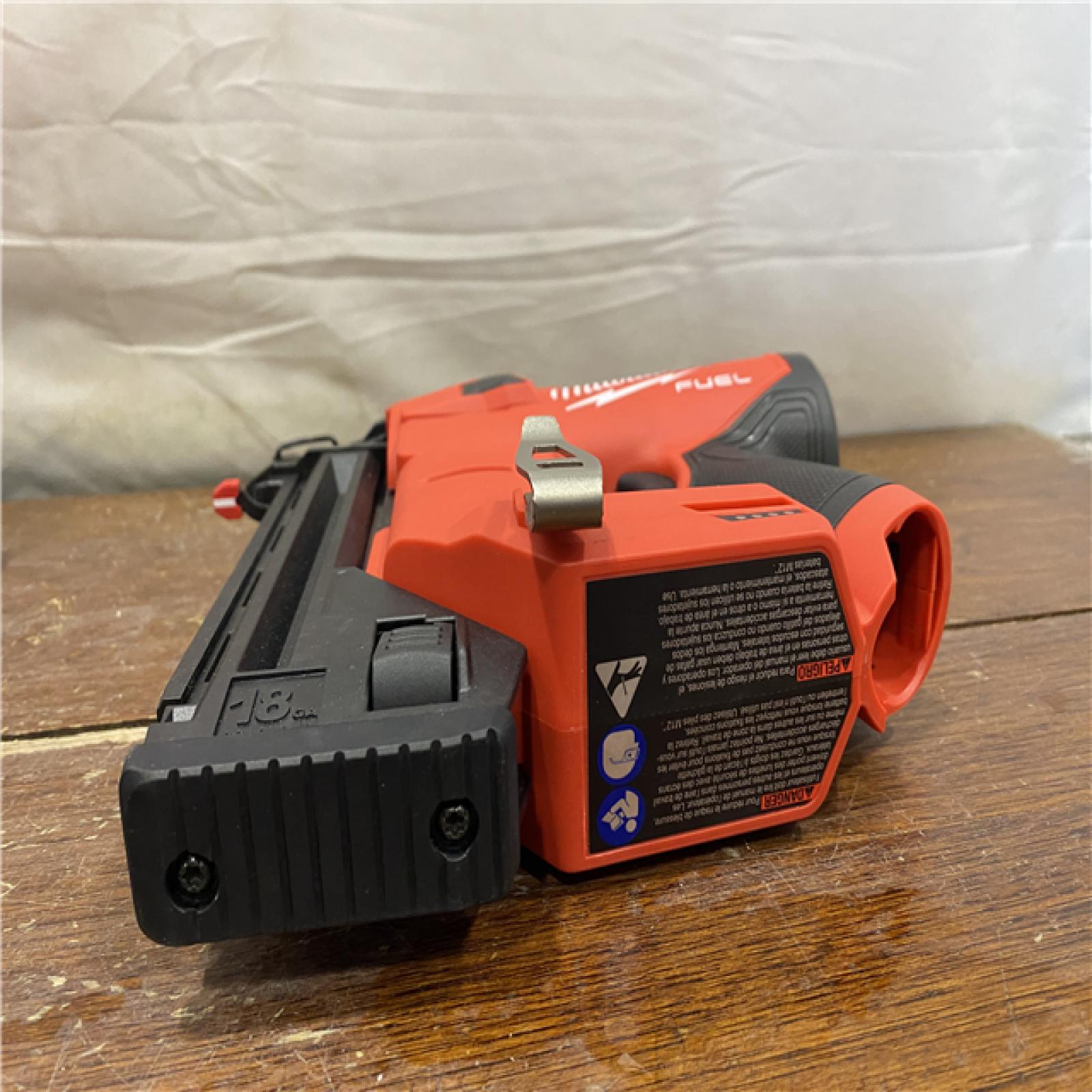 AS-IS M12 FUEL 12-Volt Lithium-Ion Brushless Cordless 18-Guage Compact Brad Nailer (Tool Only)