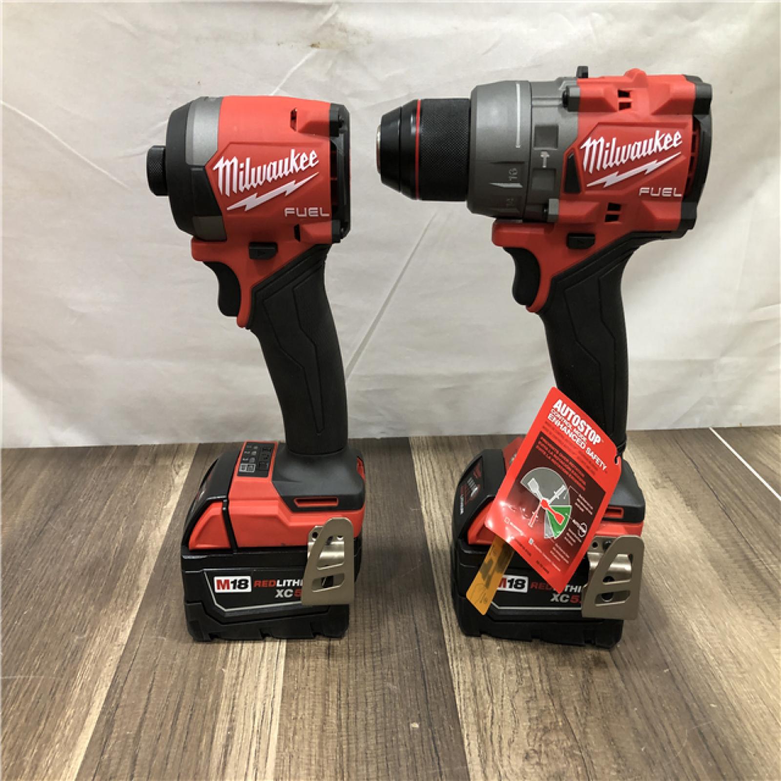 AS-IS Milwaukee FUEL 18V Lithium-Ion Brushless Cordless Hammer Drill and Impact Driver Combo Kit