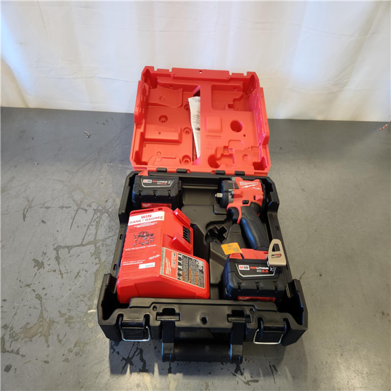 AS-IS- Milwaukee FUEL 18V Lithium-Ion Brushless Cordless 3/8 in. Compact Impact Wrench Kit