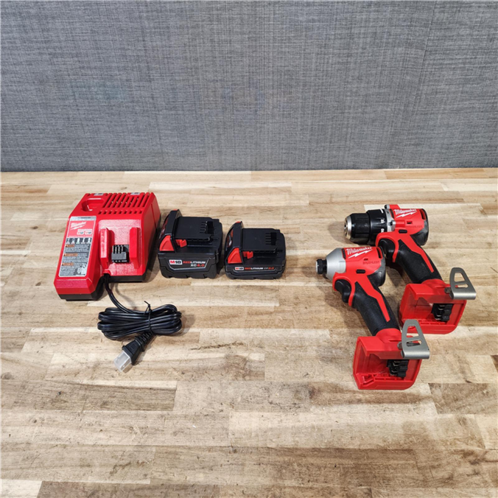 HOUSTON LOCATION - AS-IS Milwaukee 18-Volt Lithium-Ion Brushless Cordless Compact Hammer Drill/Impact Combo Kit