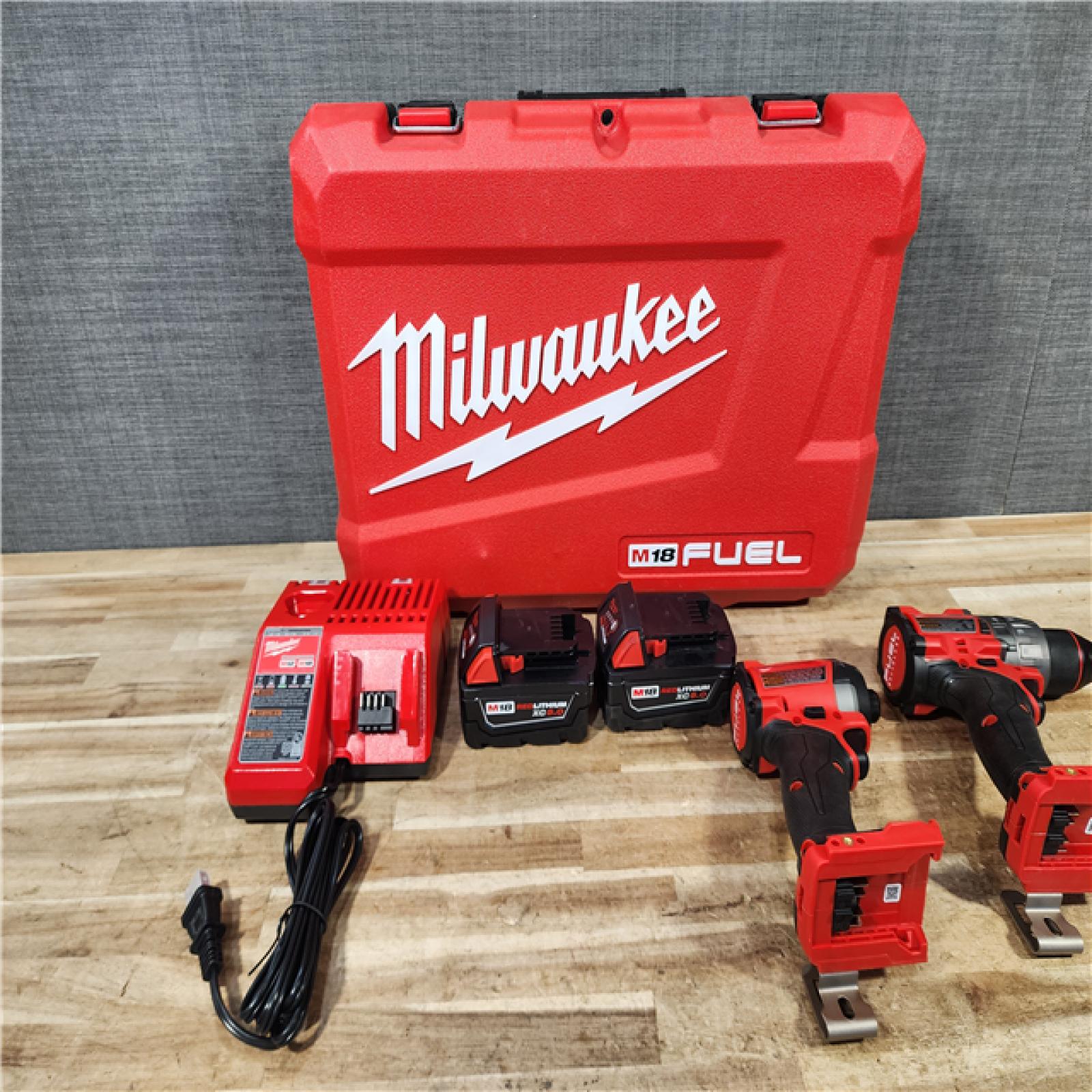 HOUSTON LOCATION - AS - IS Milwaukee FUEL 18V Lithium-Ion Brushless Cordless Hammer Drill and Impact Driver Combo Kit
