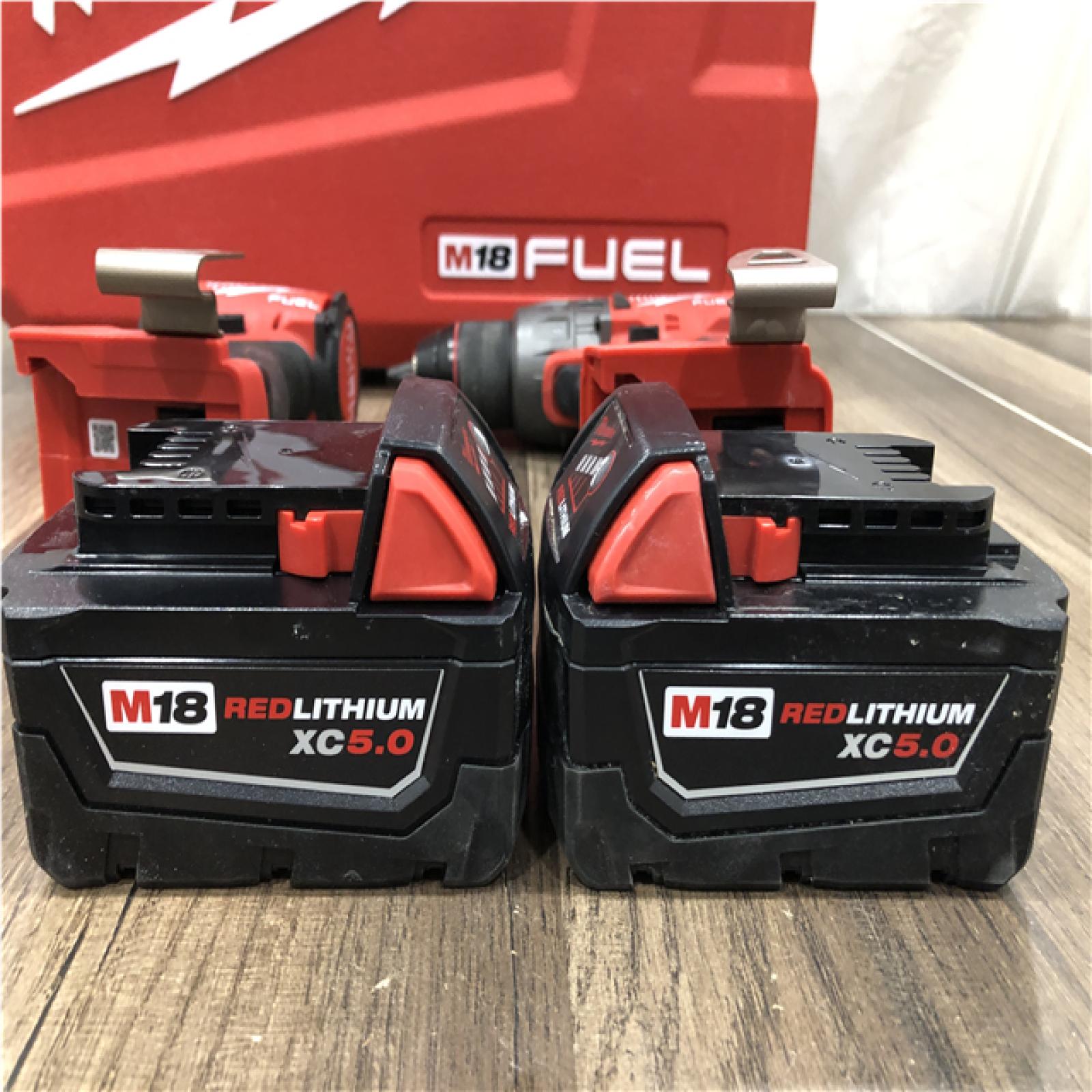 AS-IS Milwaukee FUEL 18V Lithium-Ion Brushless Cordless Hammer Drill and Impact Driver Combo Kit