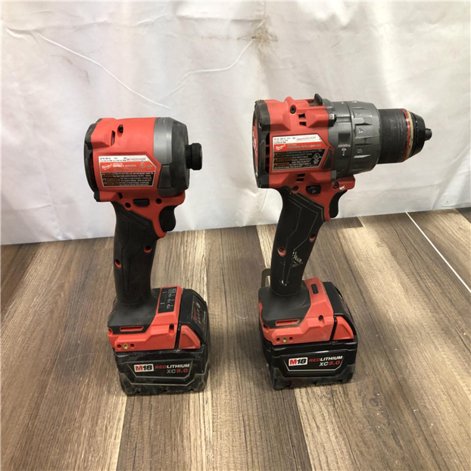 AS-IS Milwaukee FUEL 18V Lithium-Ion Brushless Cordless Hammer Drill and Impact Driver Combo Kit