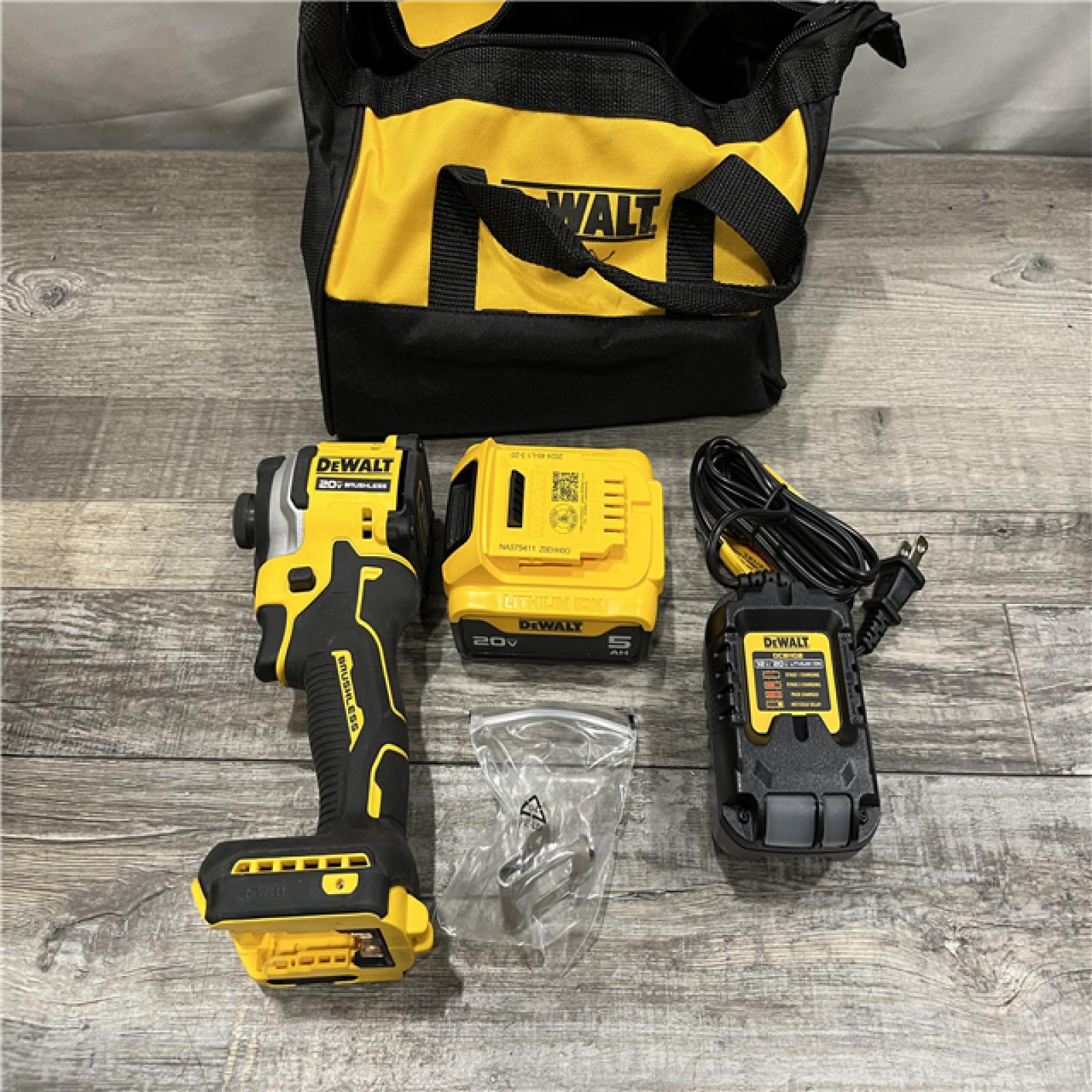 AS-IS DEWALT ATOMIC 20V MAX Lithium-Ion Cordless 1/4 in. Brushless Impact Driver Kit