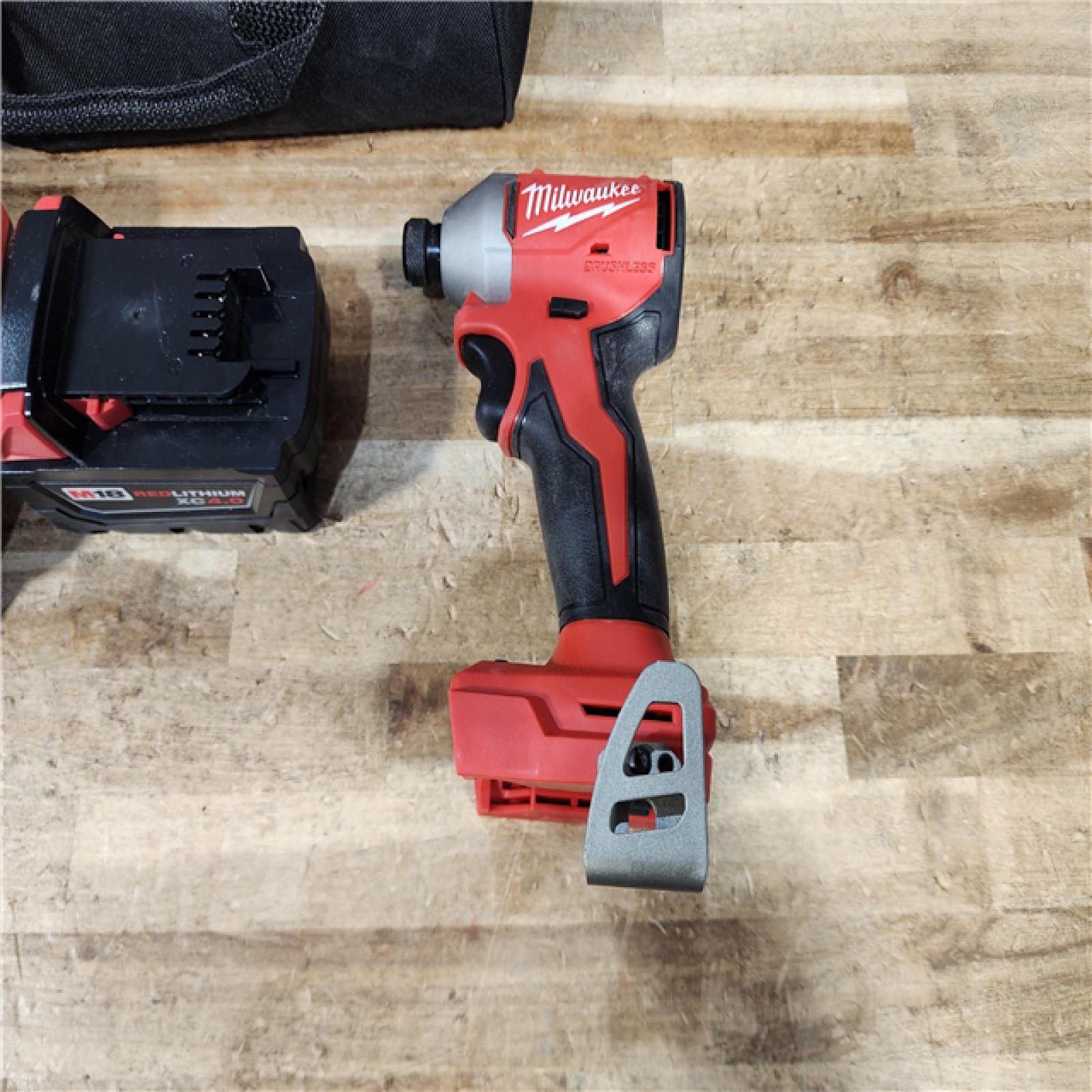 HOUSTON LOCATION - AS - IS Milwaukee 18V Lithium-Ion Compact Brushless Cordless 1/4 in. Impact Driver COMBO KIT