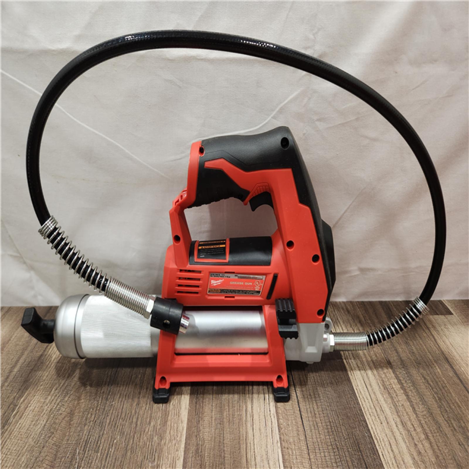 AS-IS- Milwaukee M12 Cordless LITHIUM-ION Grease Gun (Tool-Only)